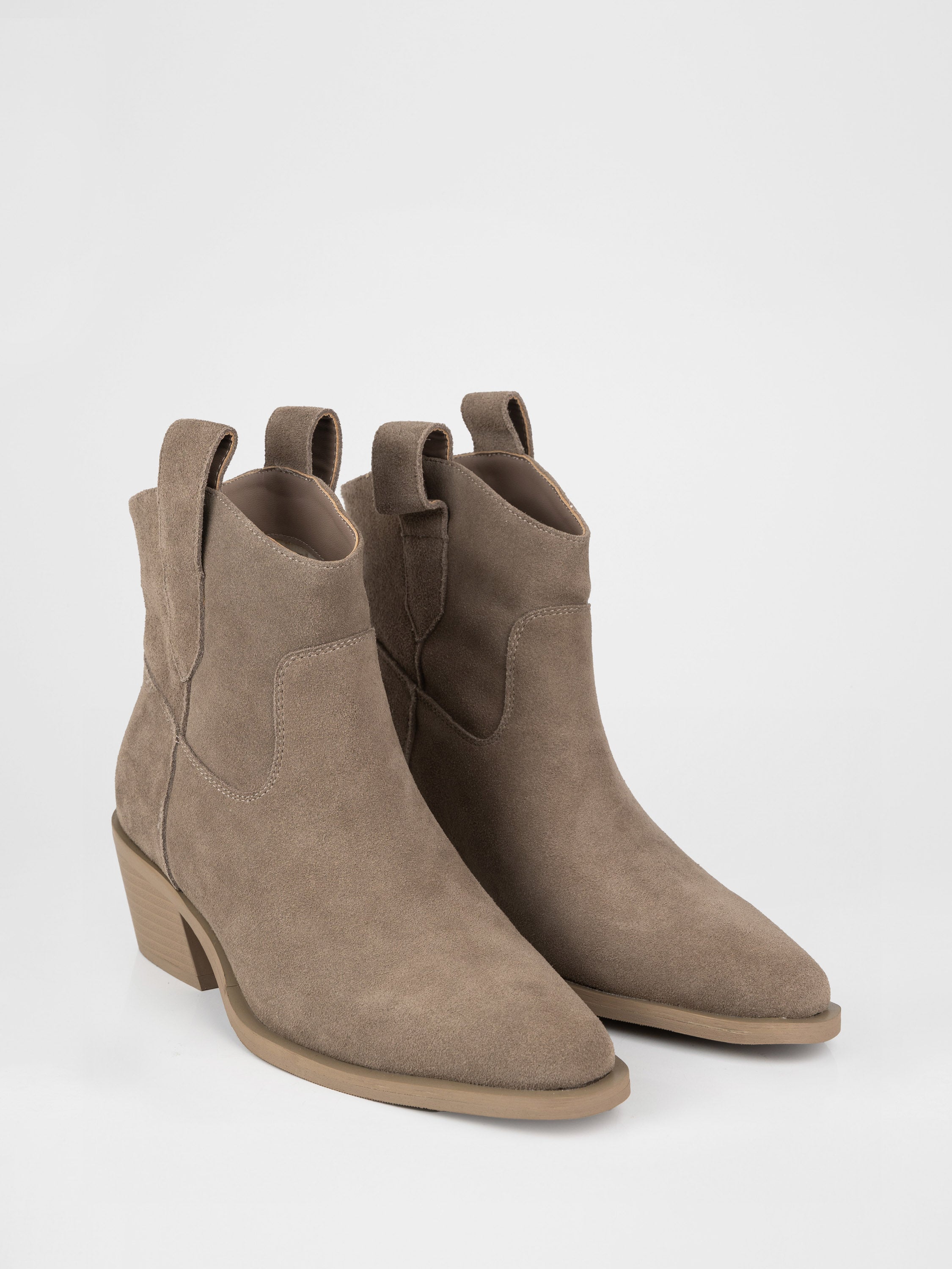 Suede cowboy boots in beige color