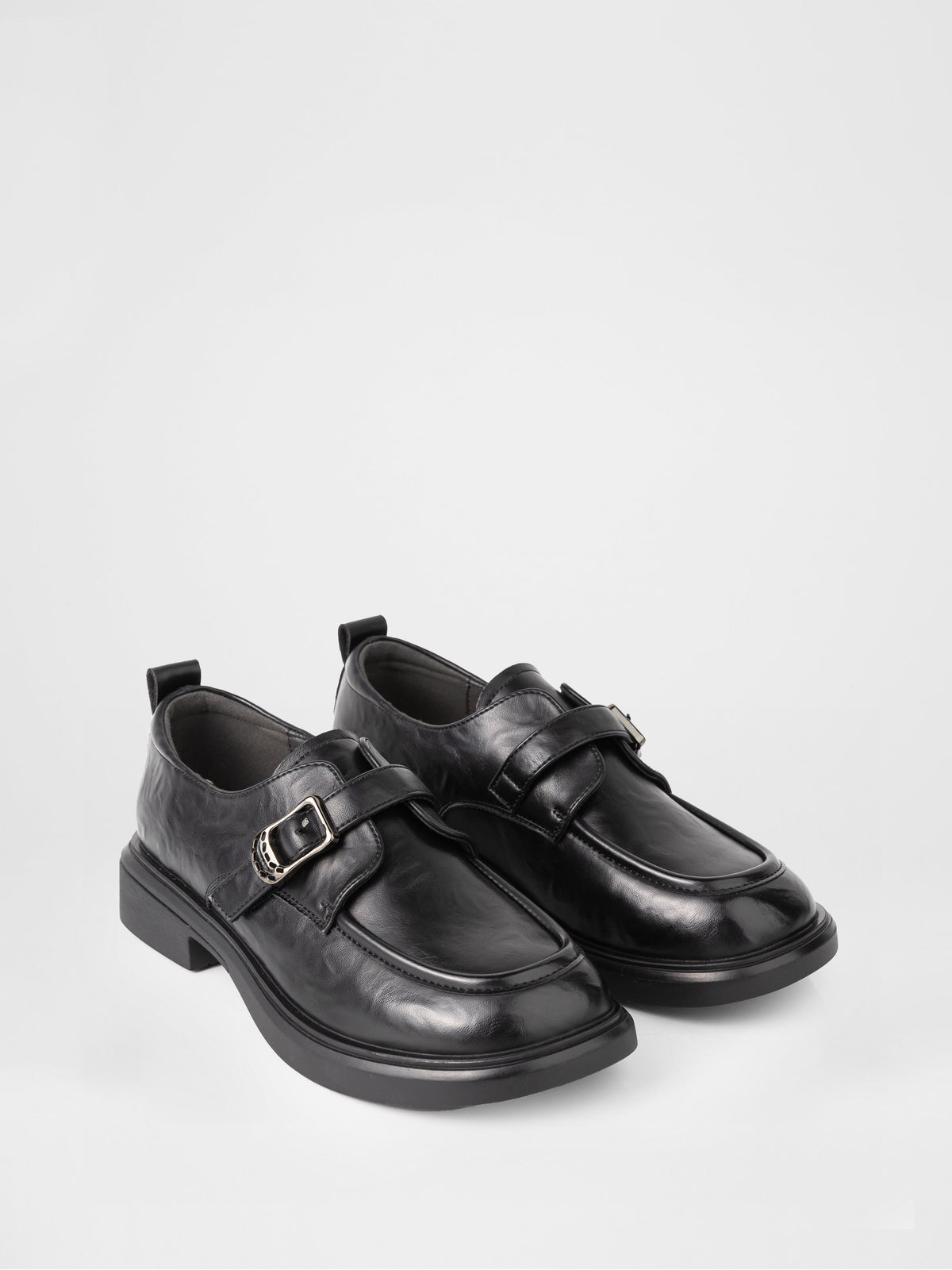 Zapatos monk de piel negra