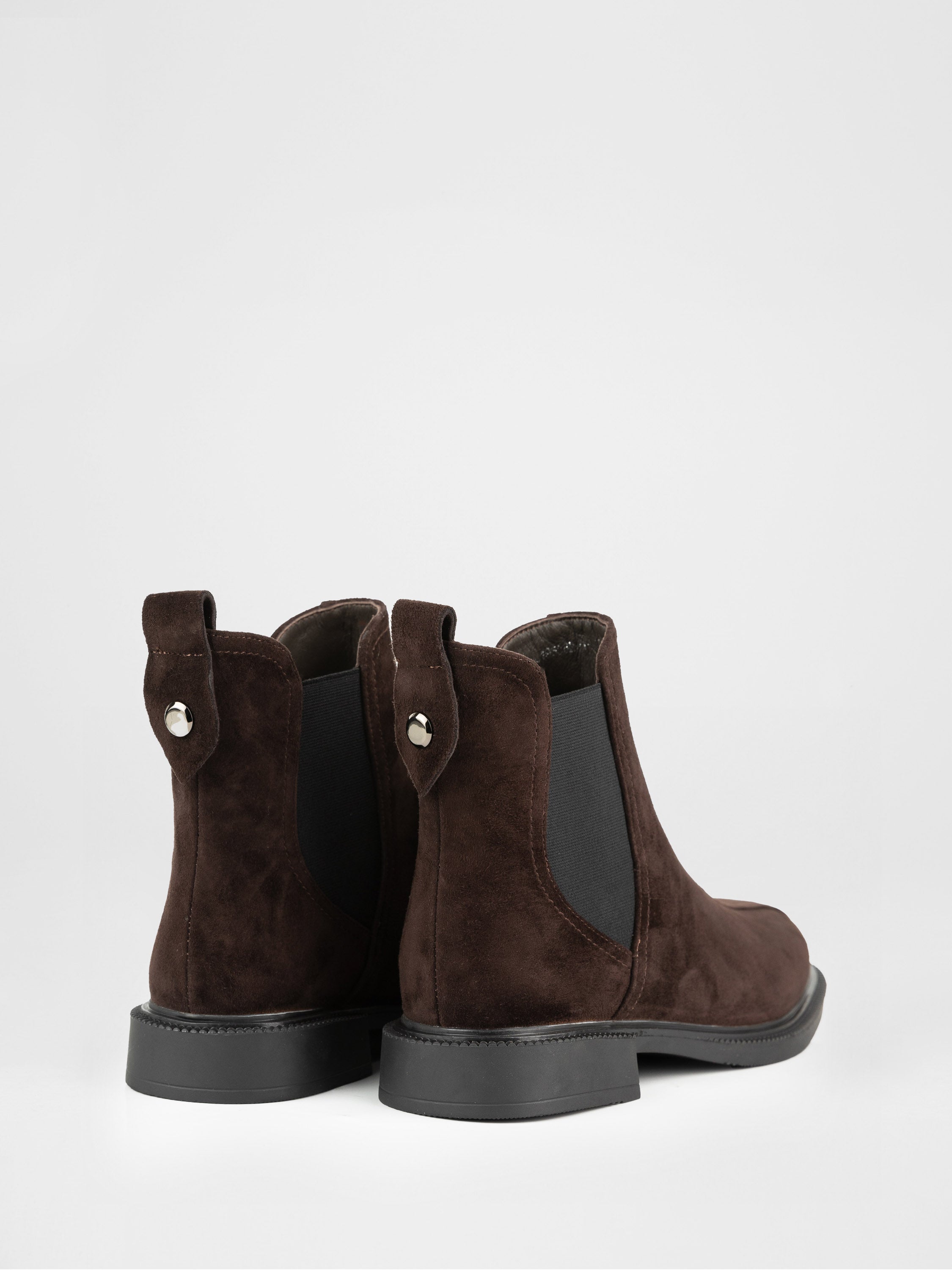 Chocolate-colored Chelsea boots