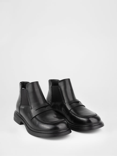 Botines de piel negra