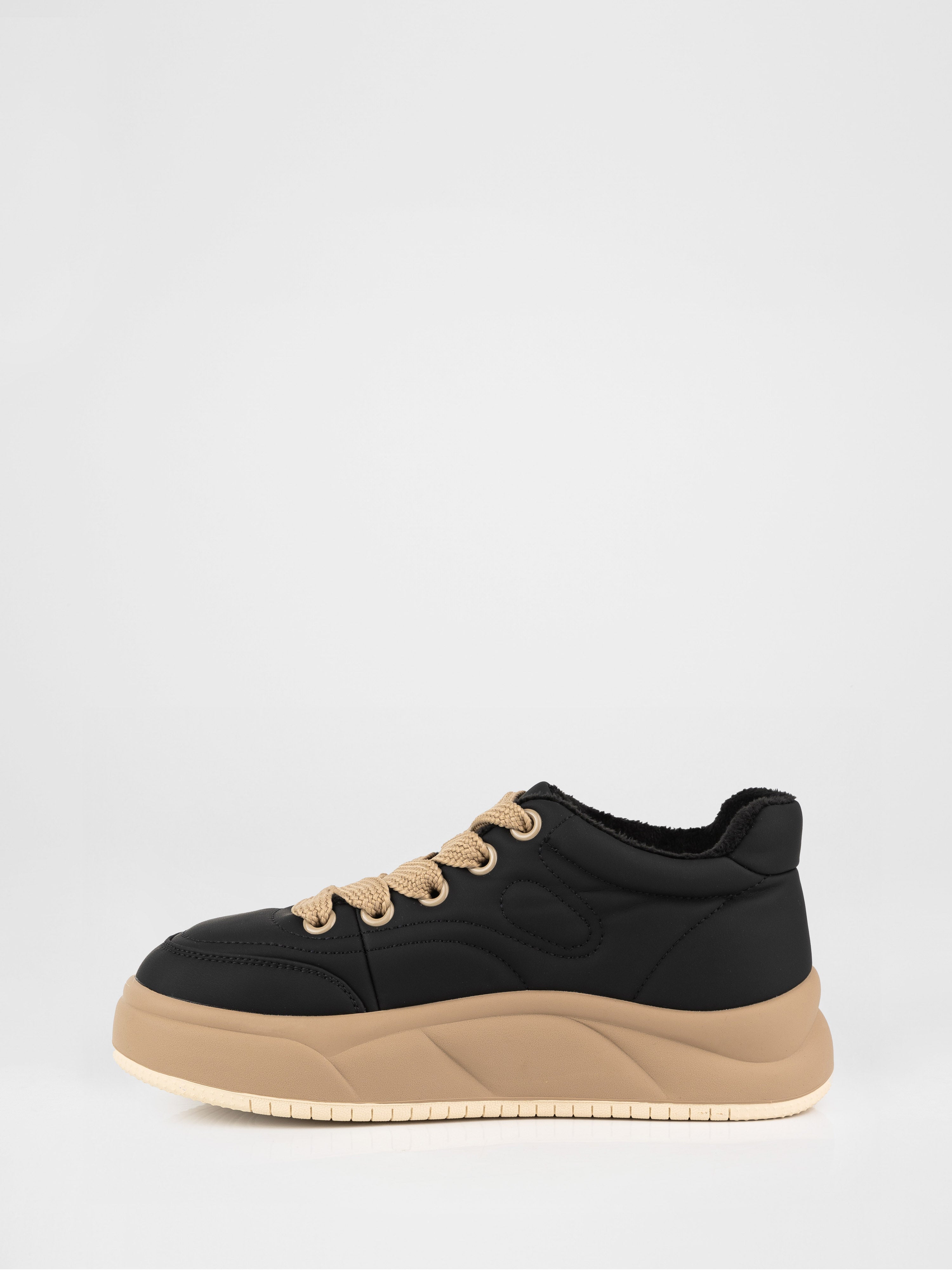 Black sneakers with contrasting sole