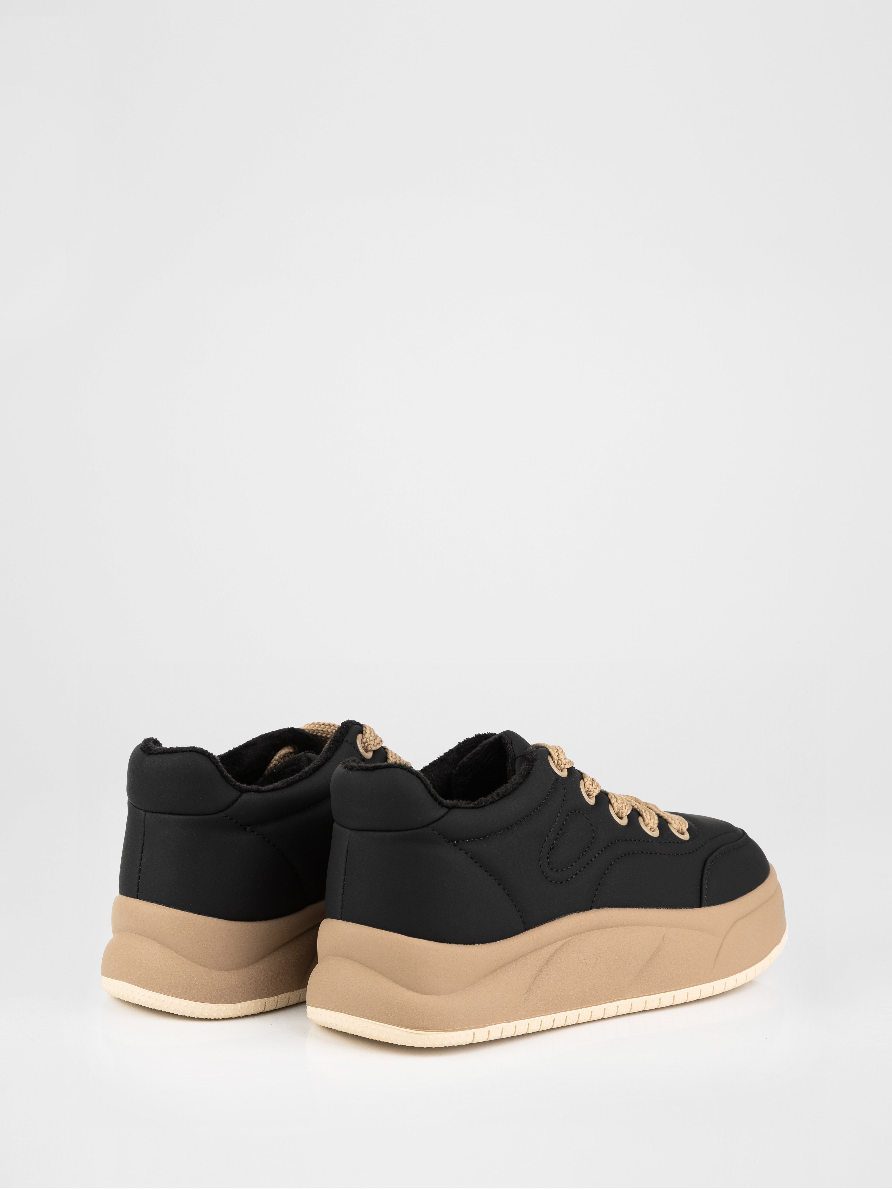 Black sneakers with contrasting sole