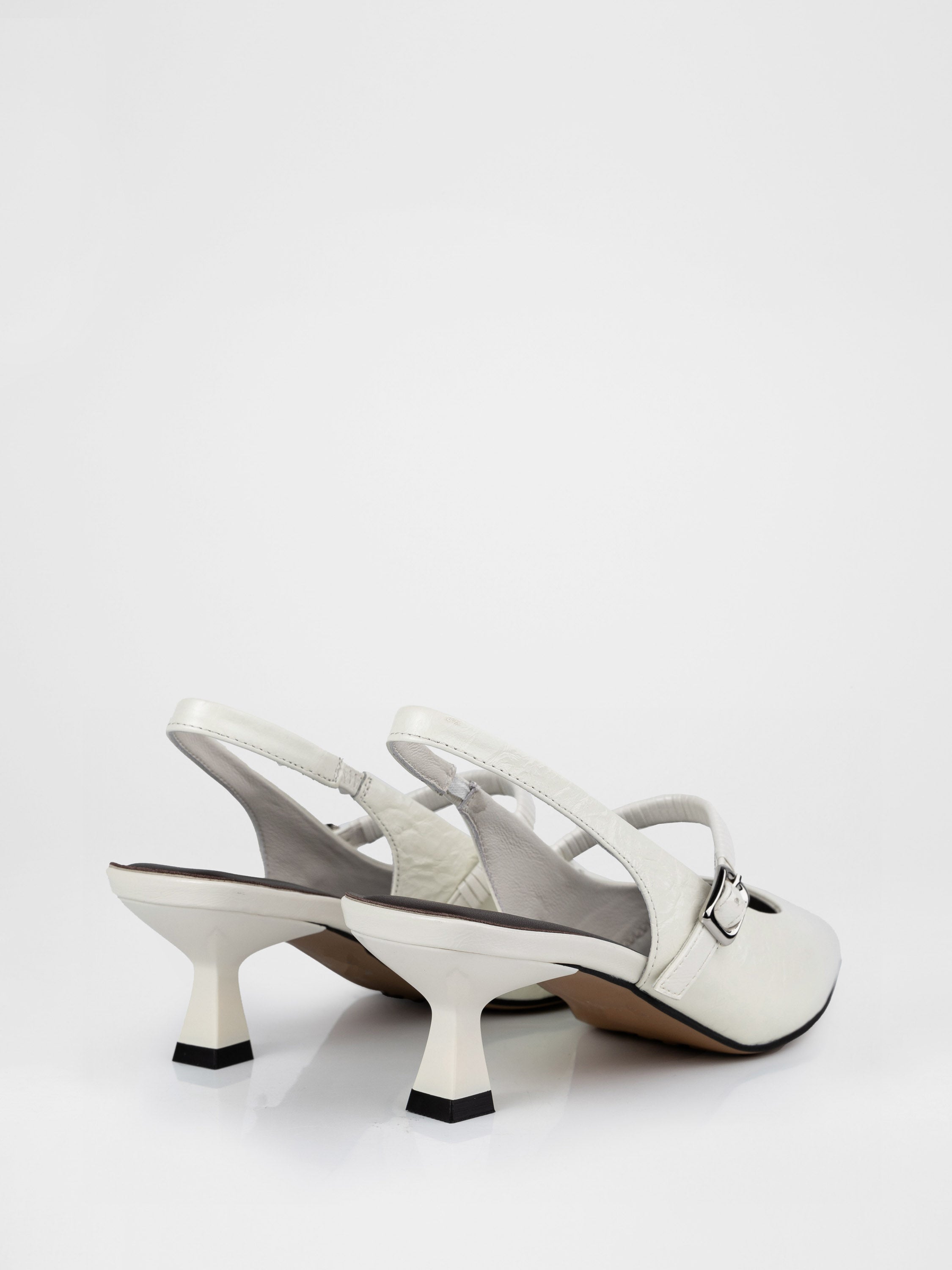 Milky-white slingbacks with a strap