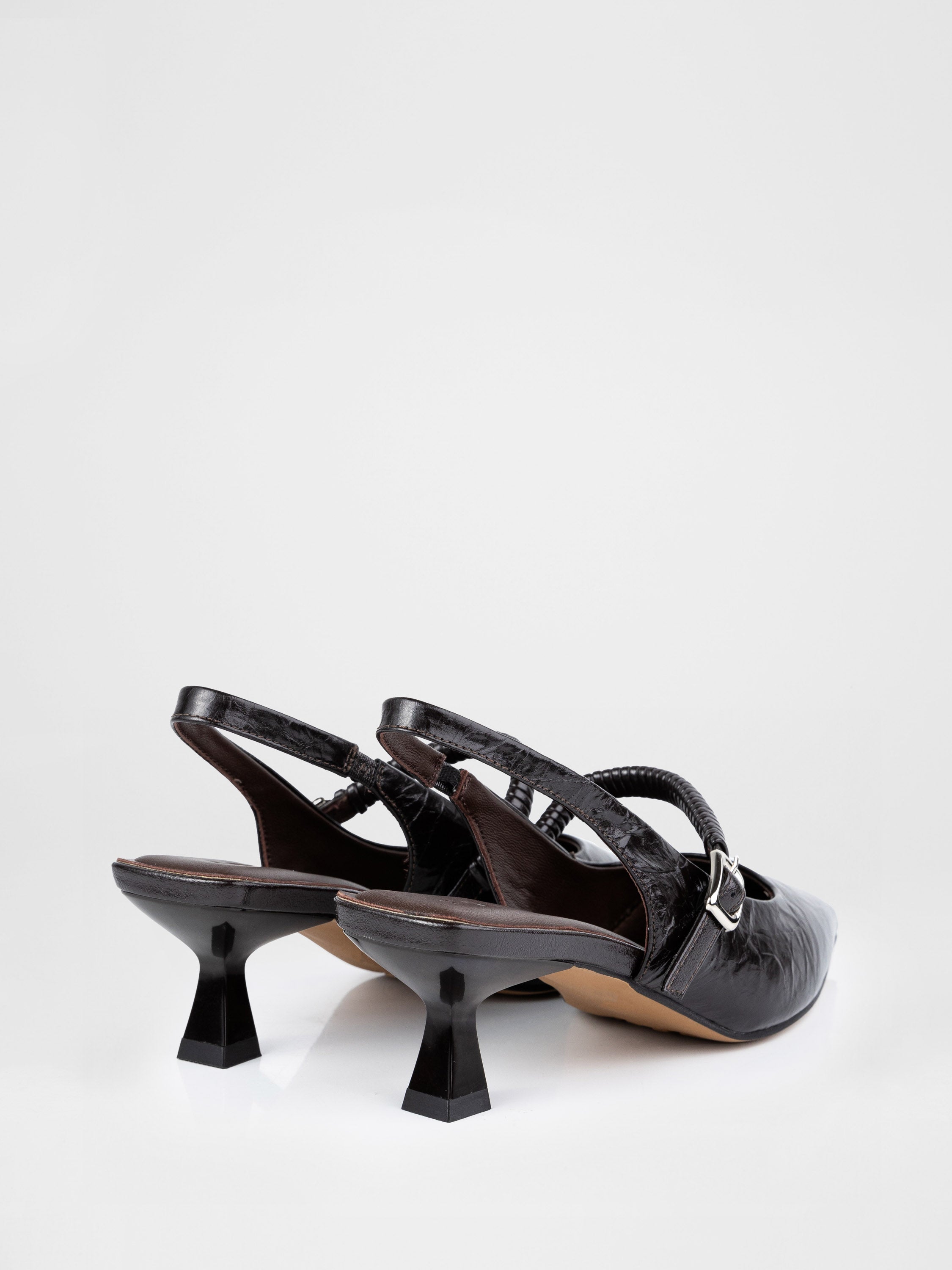 Chocolate-colored patent leather slingbacks