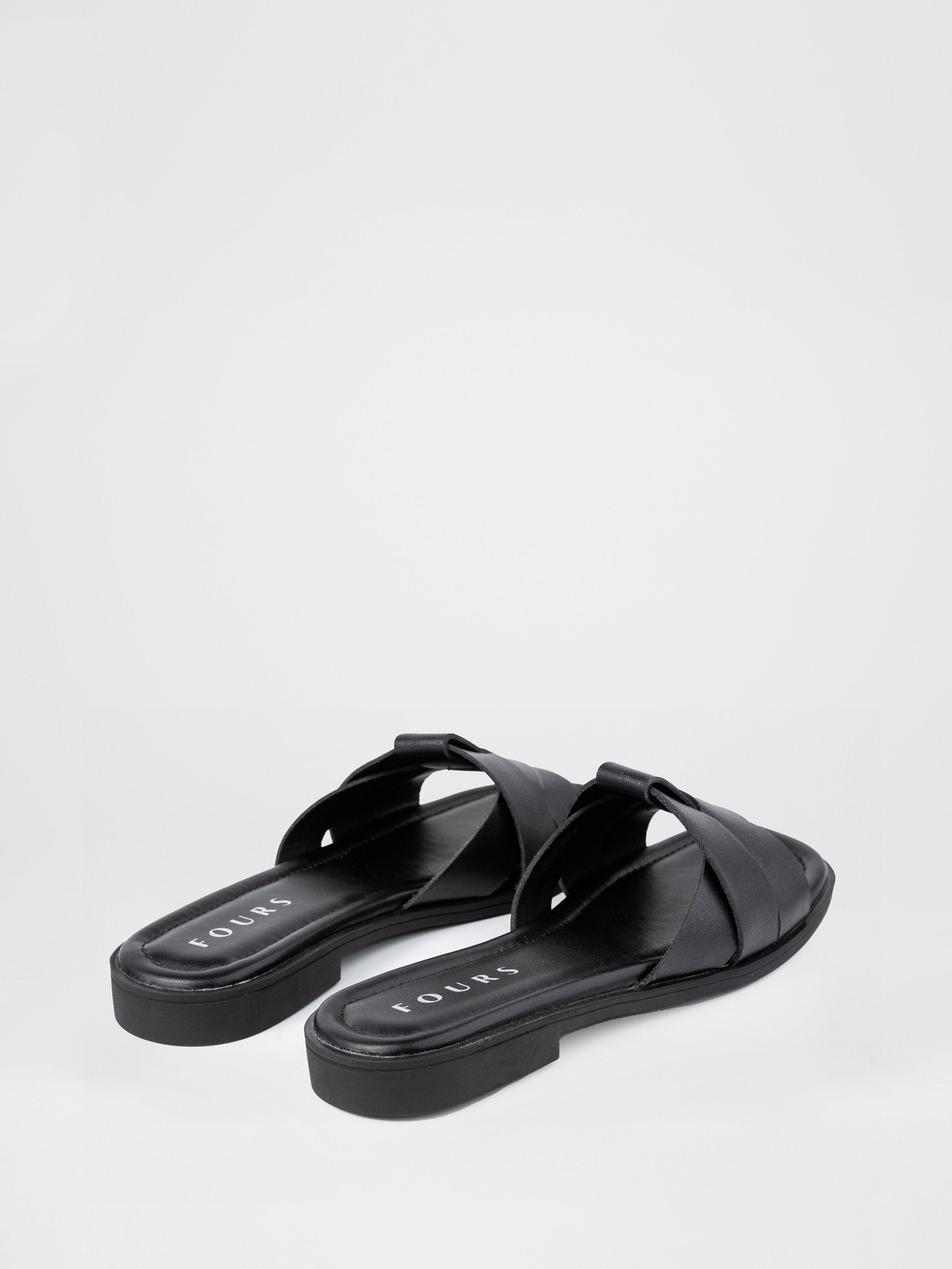 Black clogs with crisscross straps