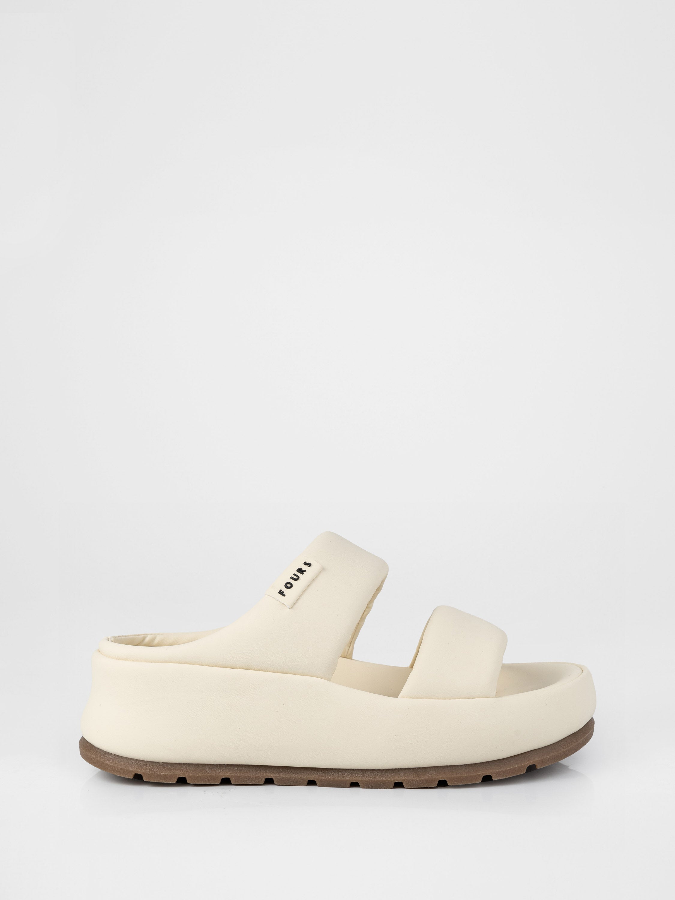 Light-colored clogs with thick soles