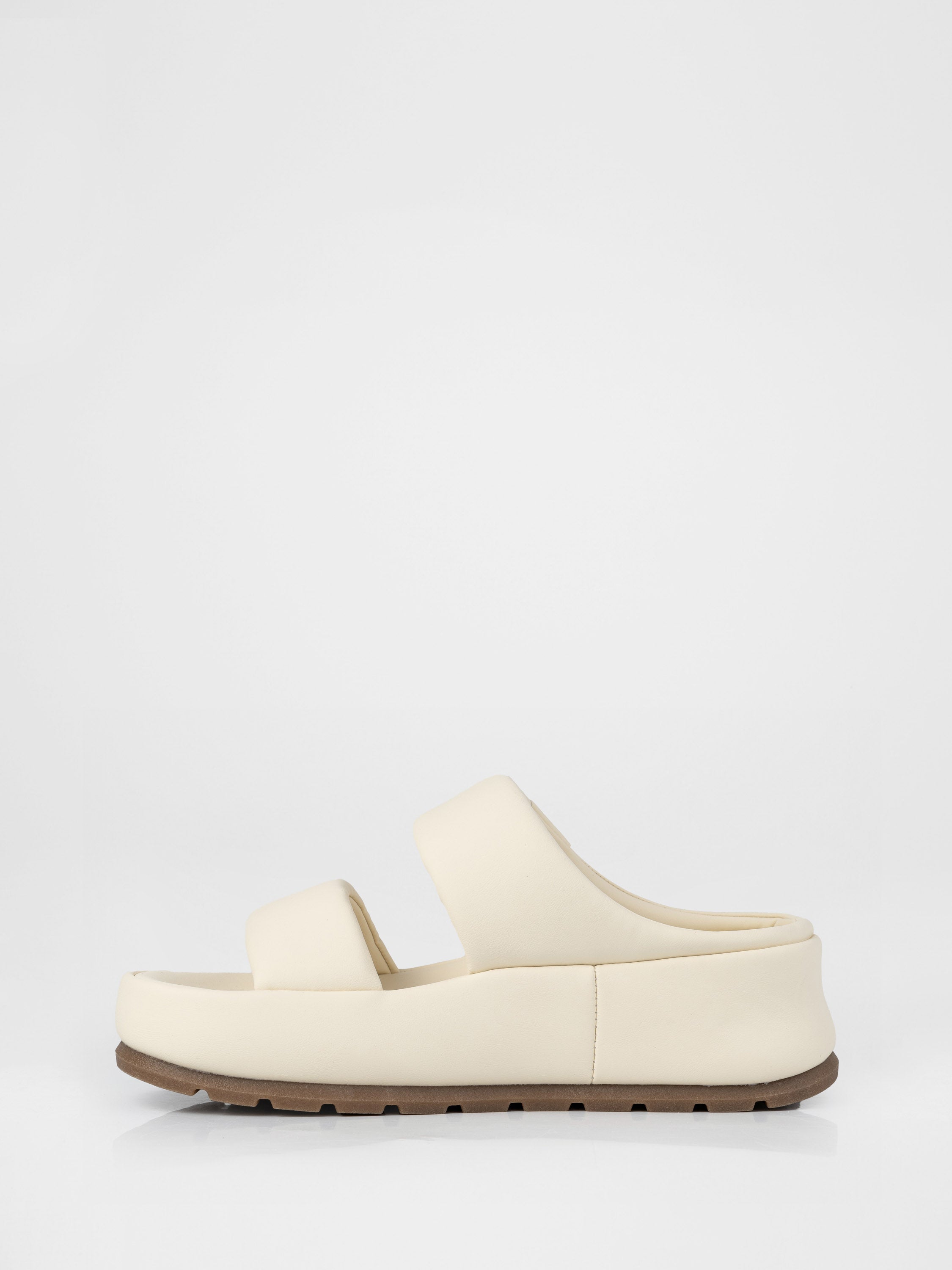 Light-colored clogs with thick soles