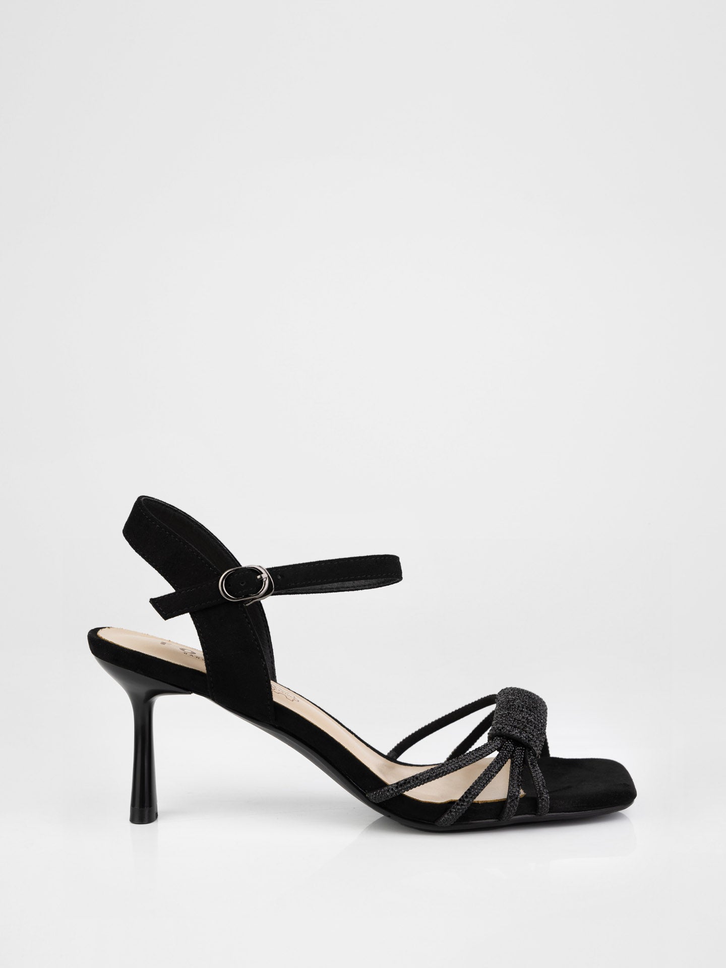 Sandals in black decorated with stones