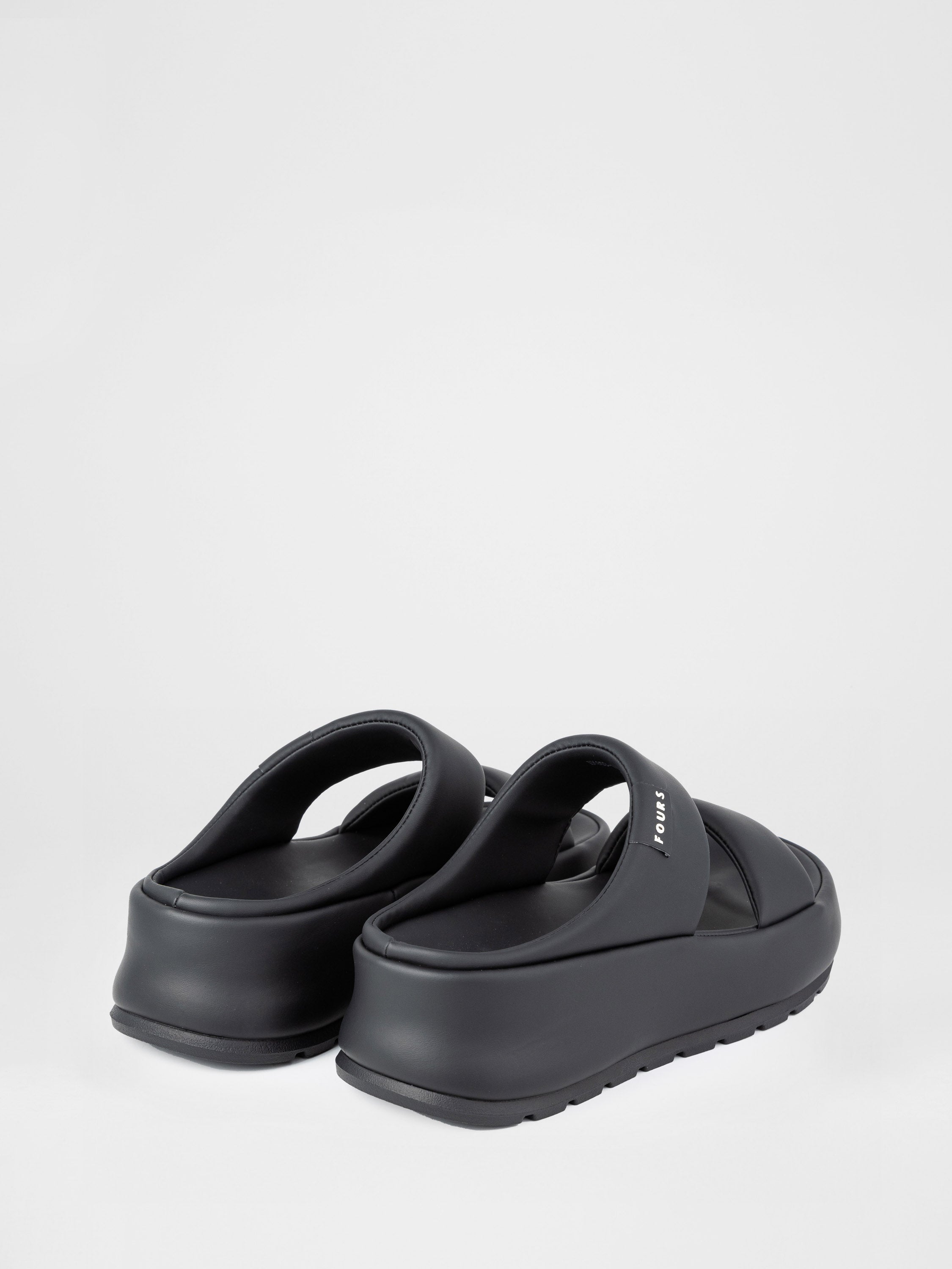 Black clogs with thick soles