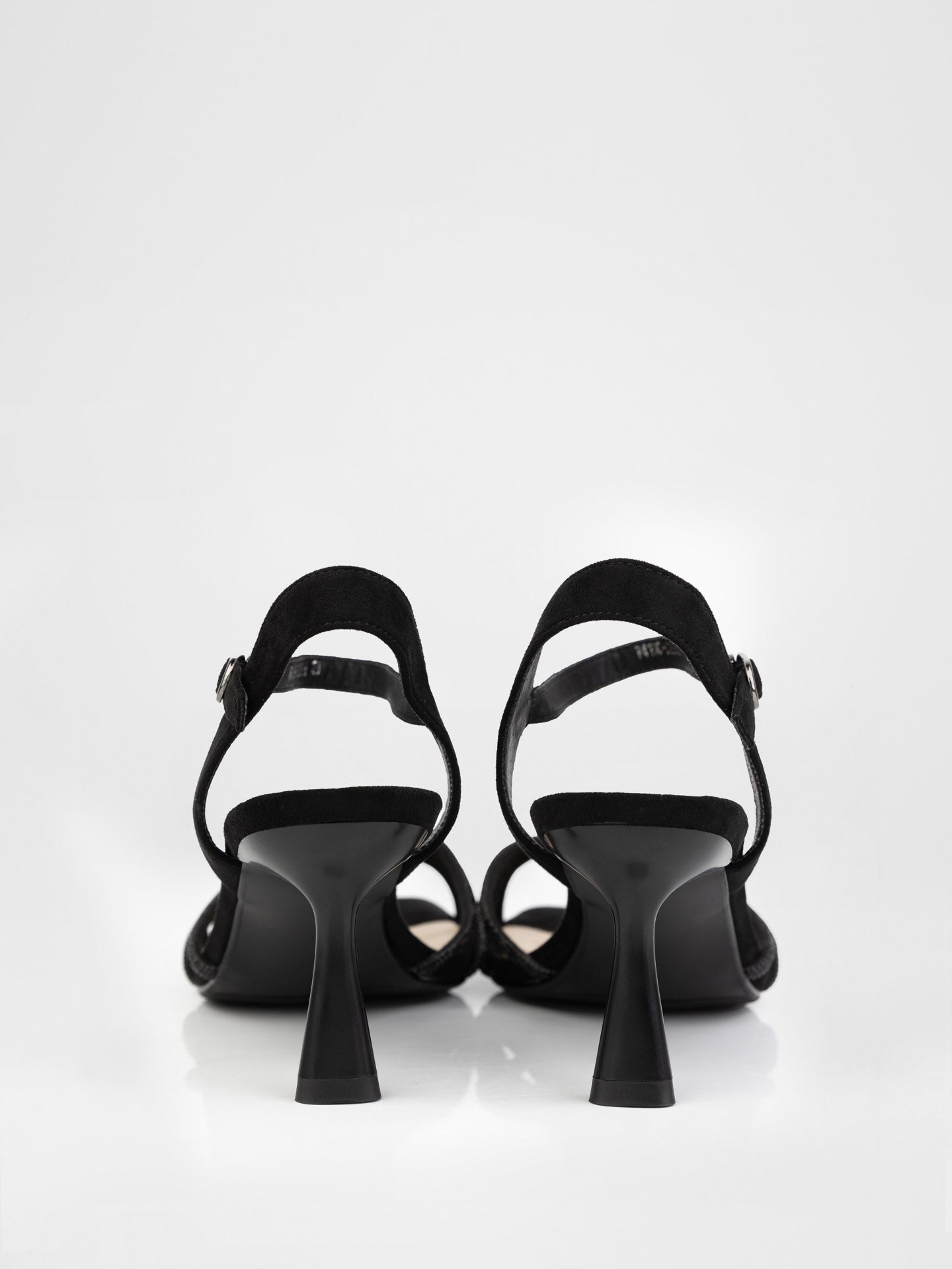 Sandals in black decorated with stones