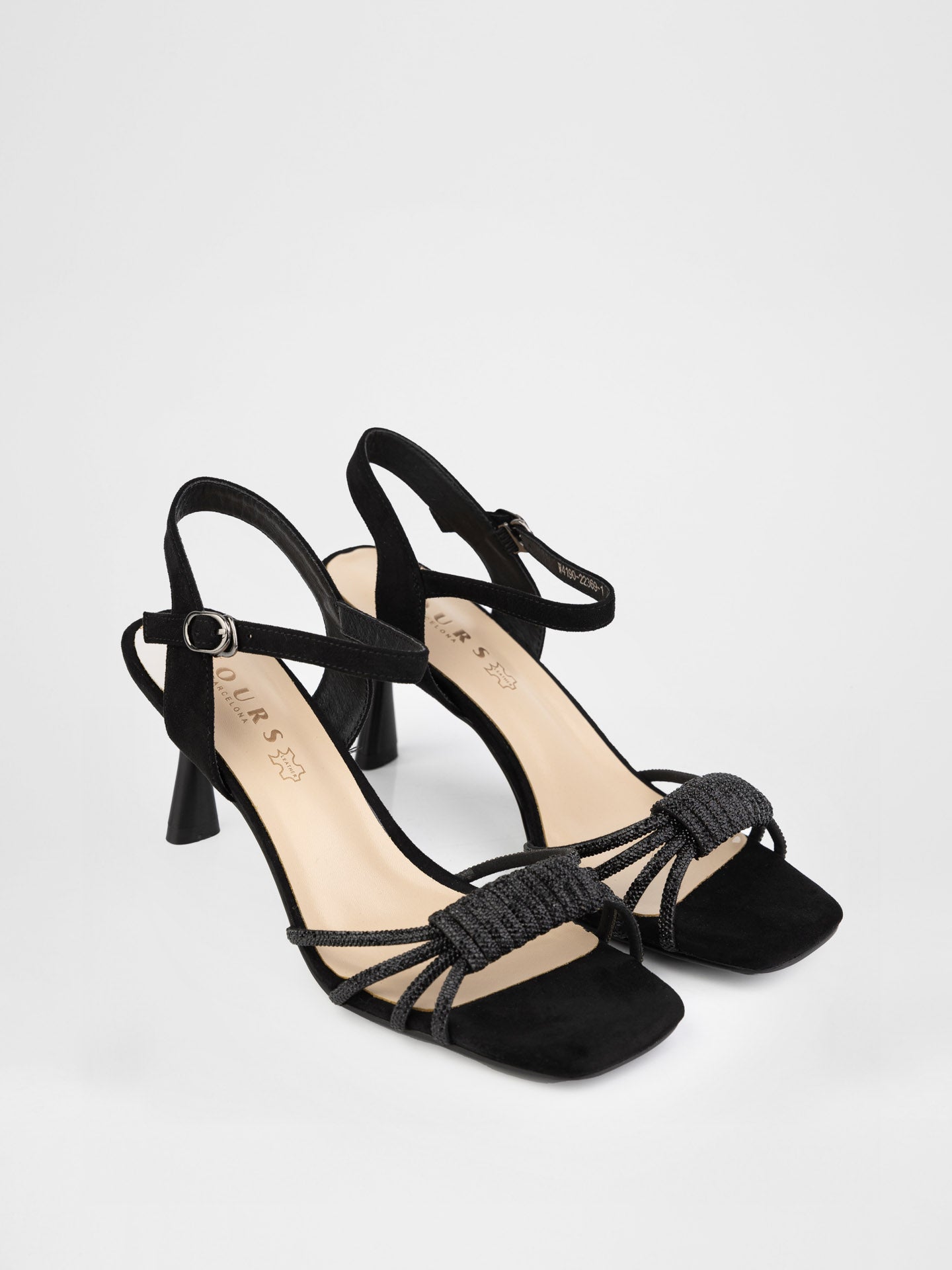 Sandals in black decorated with stones