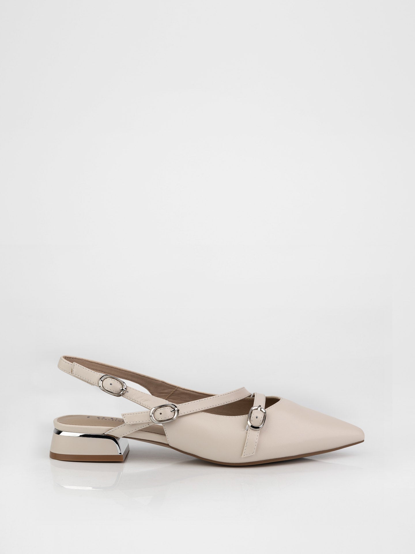 Beige slingbacks decorated with buckles