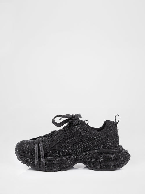 Zapatillas deportivas negras con piedras decorativas