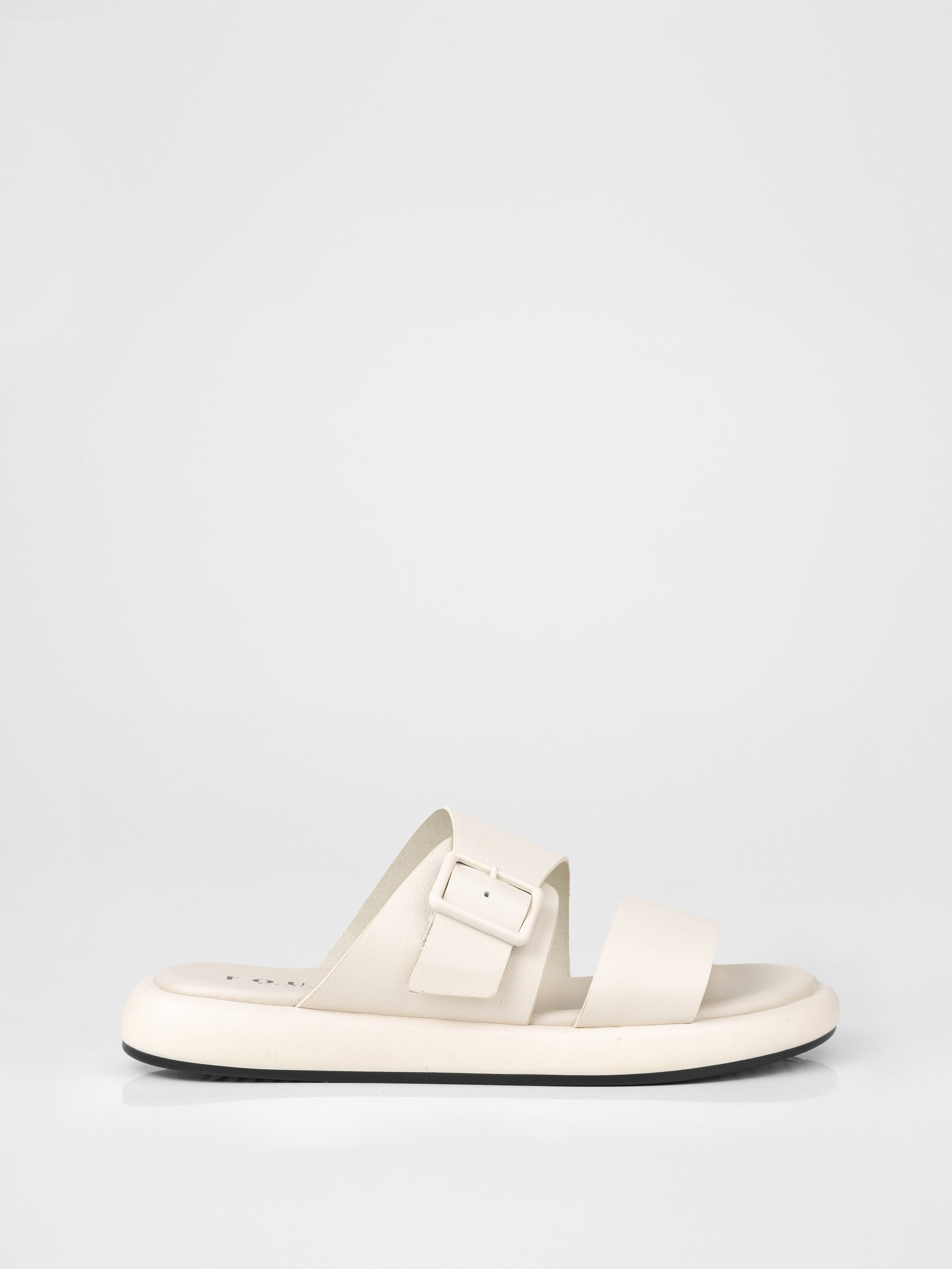 Cream-colored clogs decorated with a buckle