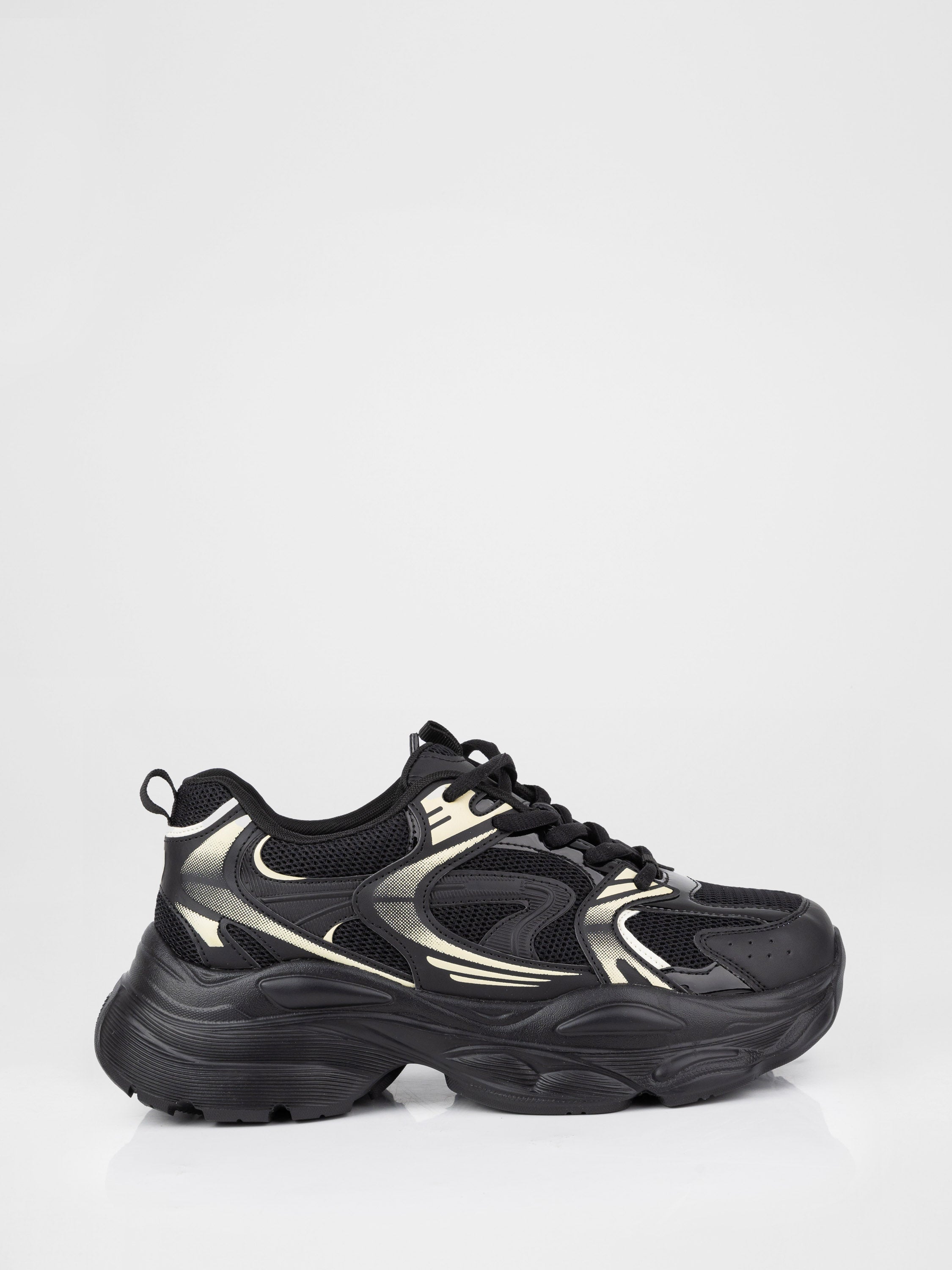 Sneakers in a black-and-white design with a chunky sole