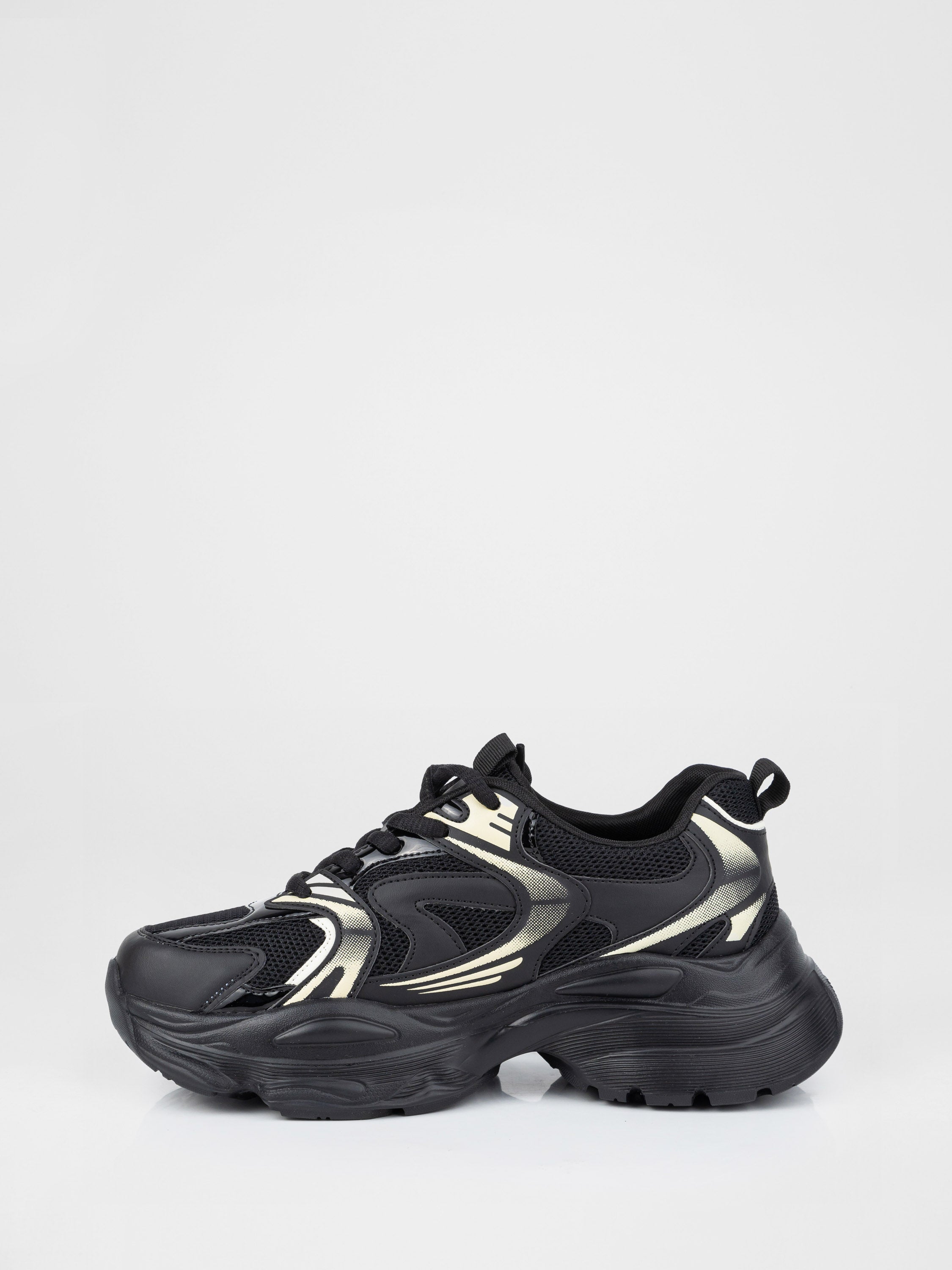 Sneakers in a black-and-white design with a chunky sole