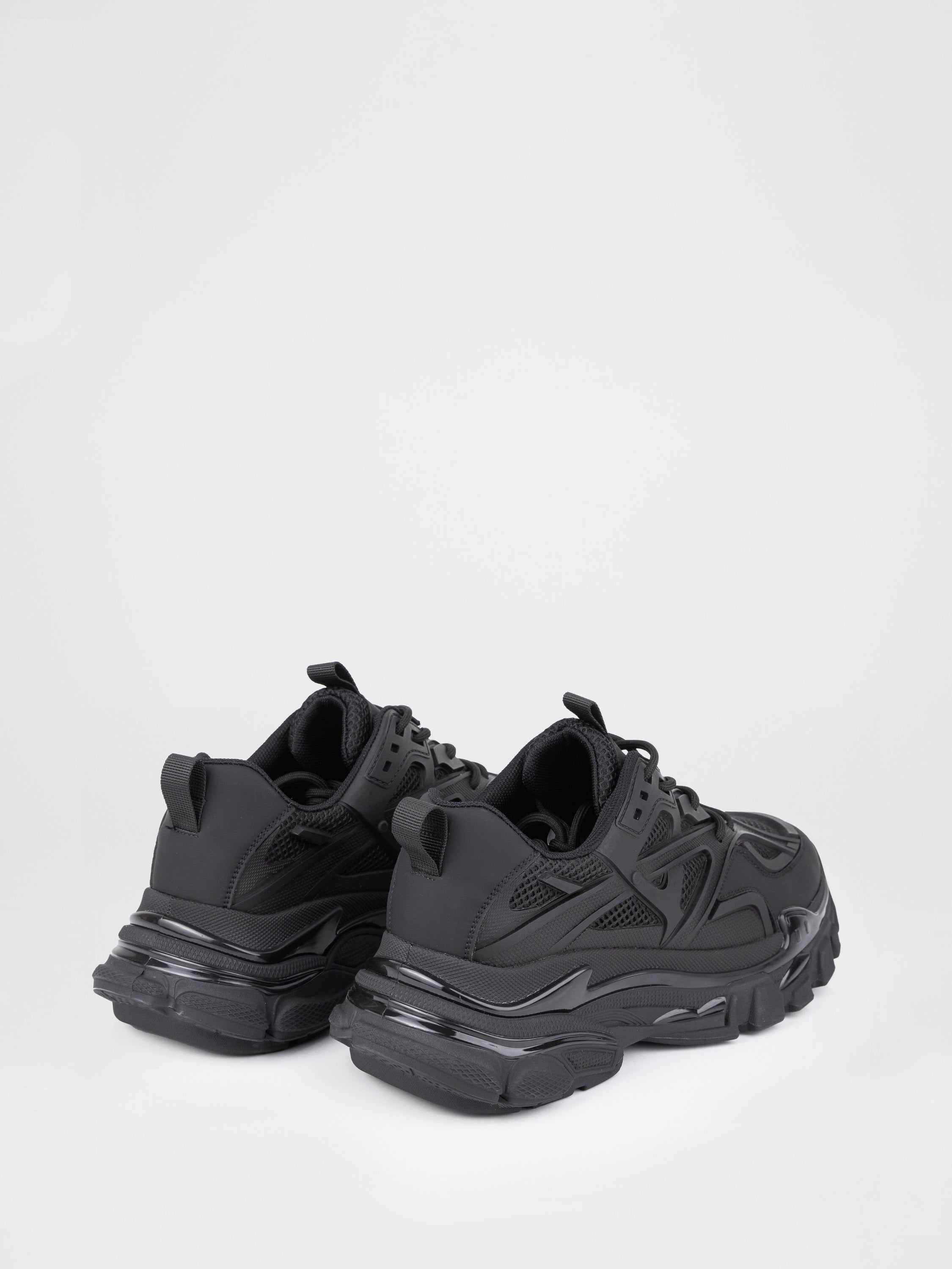 Black sneakers with a chunky sole