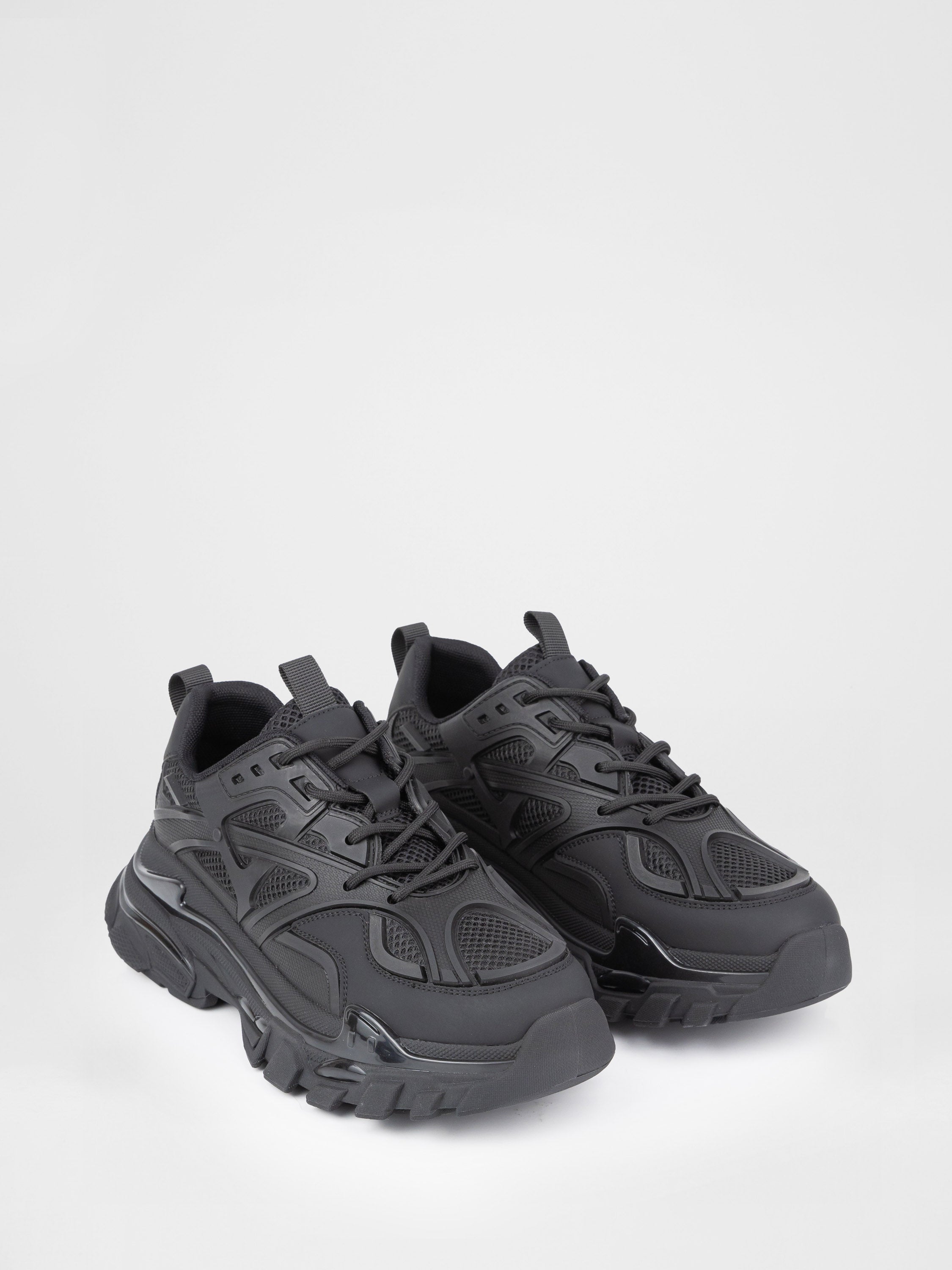 Black sneakers with a chunky sole