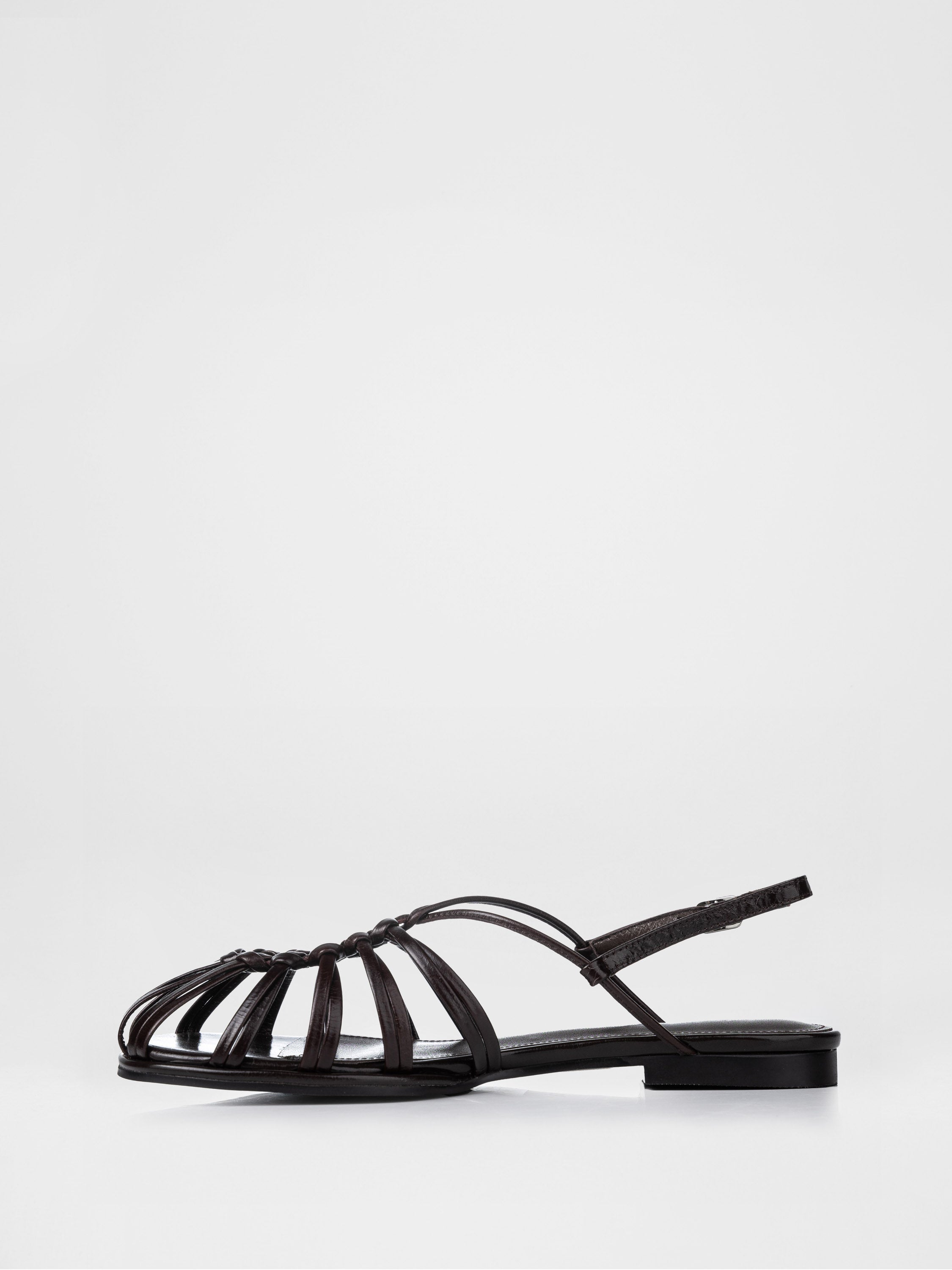 Woven sandals in chocolate color
