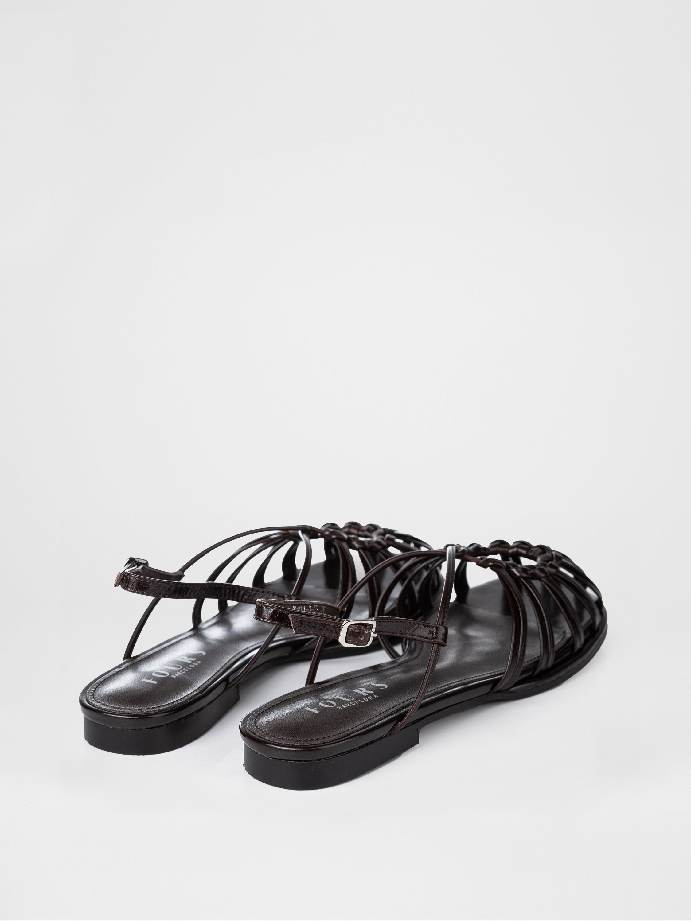 Woven sandals in chocolate color