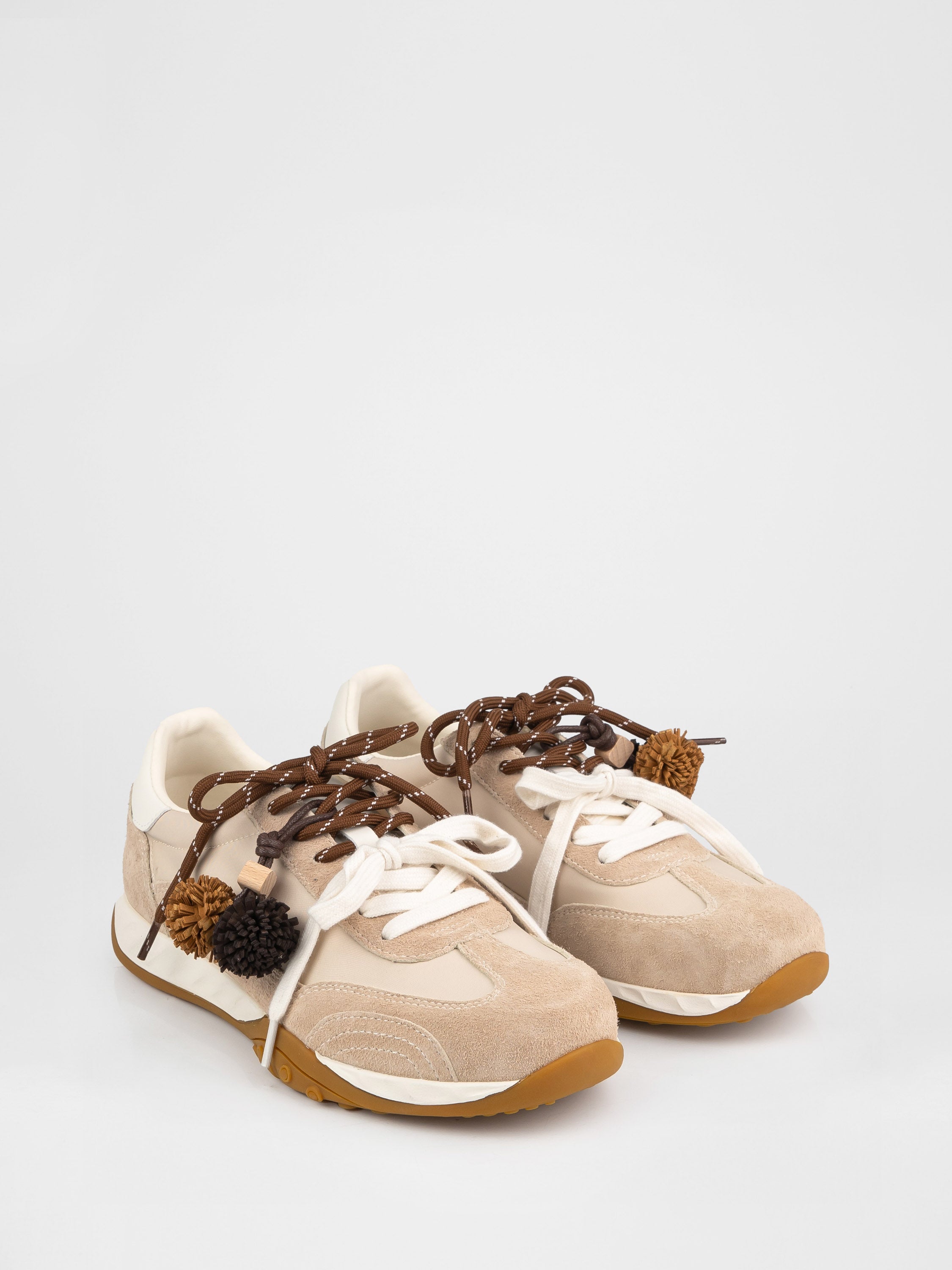 Trendy sneakers in beige