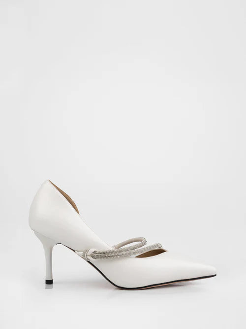 White pumps decorated with rhinestones