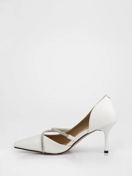 White pumps decorated with rhinestones