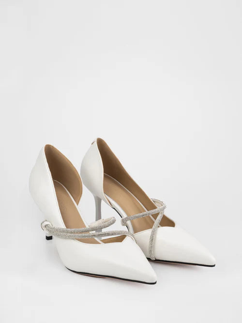 White pumps decorated with rhinestones