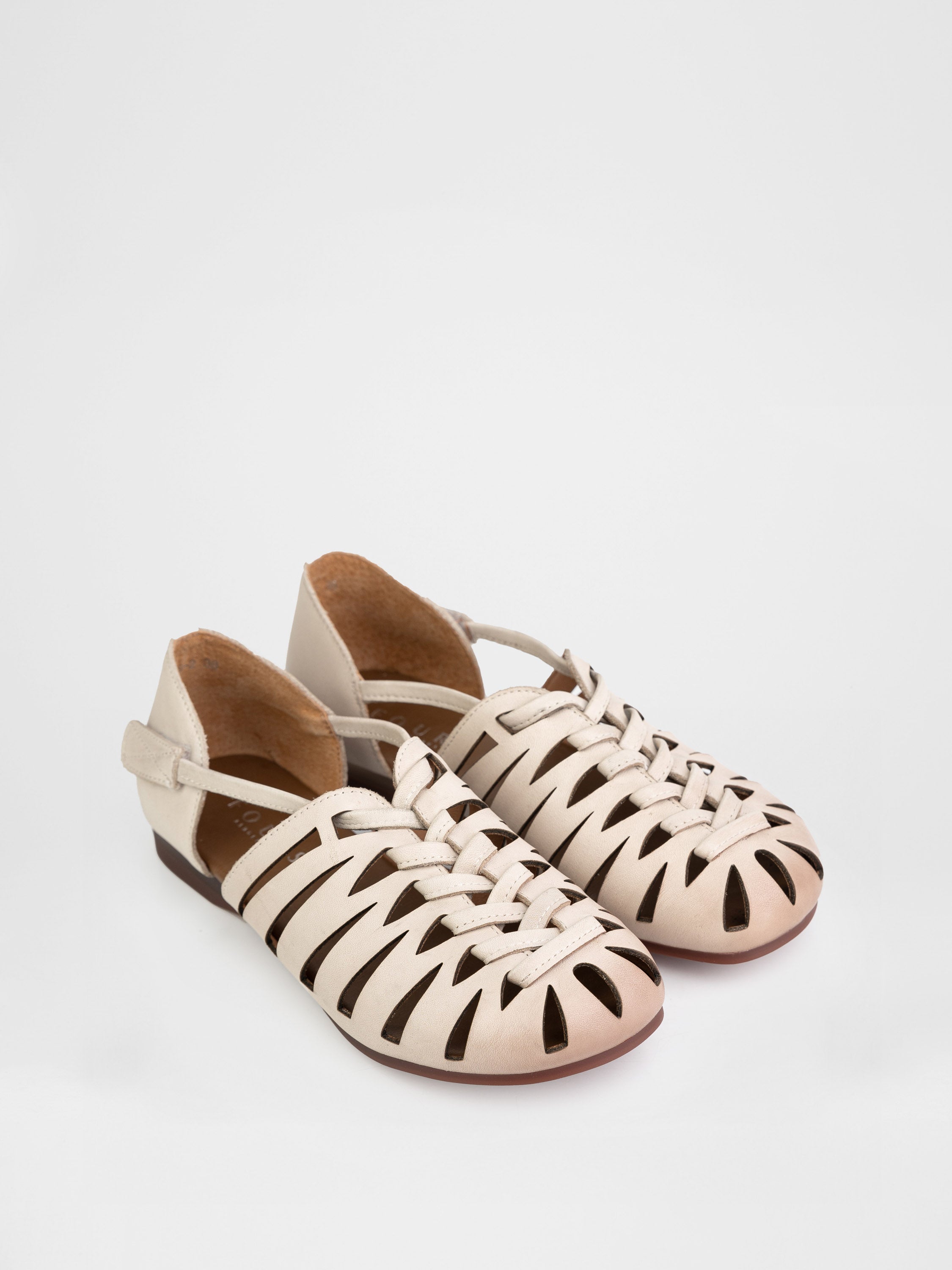 Woven sandals in beige color