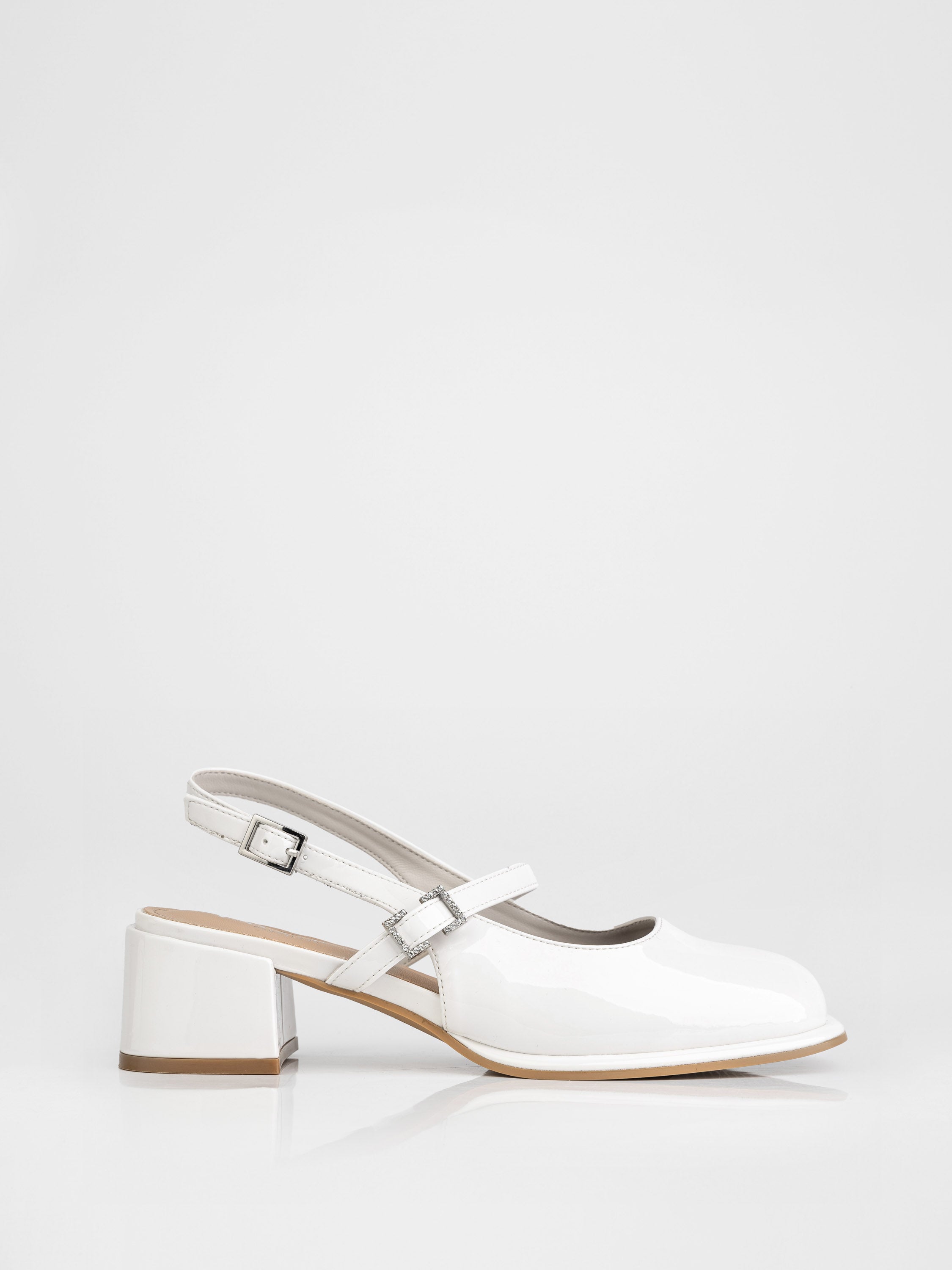 Slingbacks with stable heels in milky color.