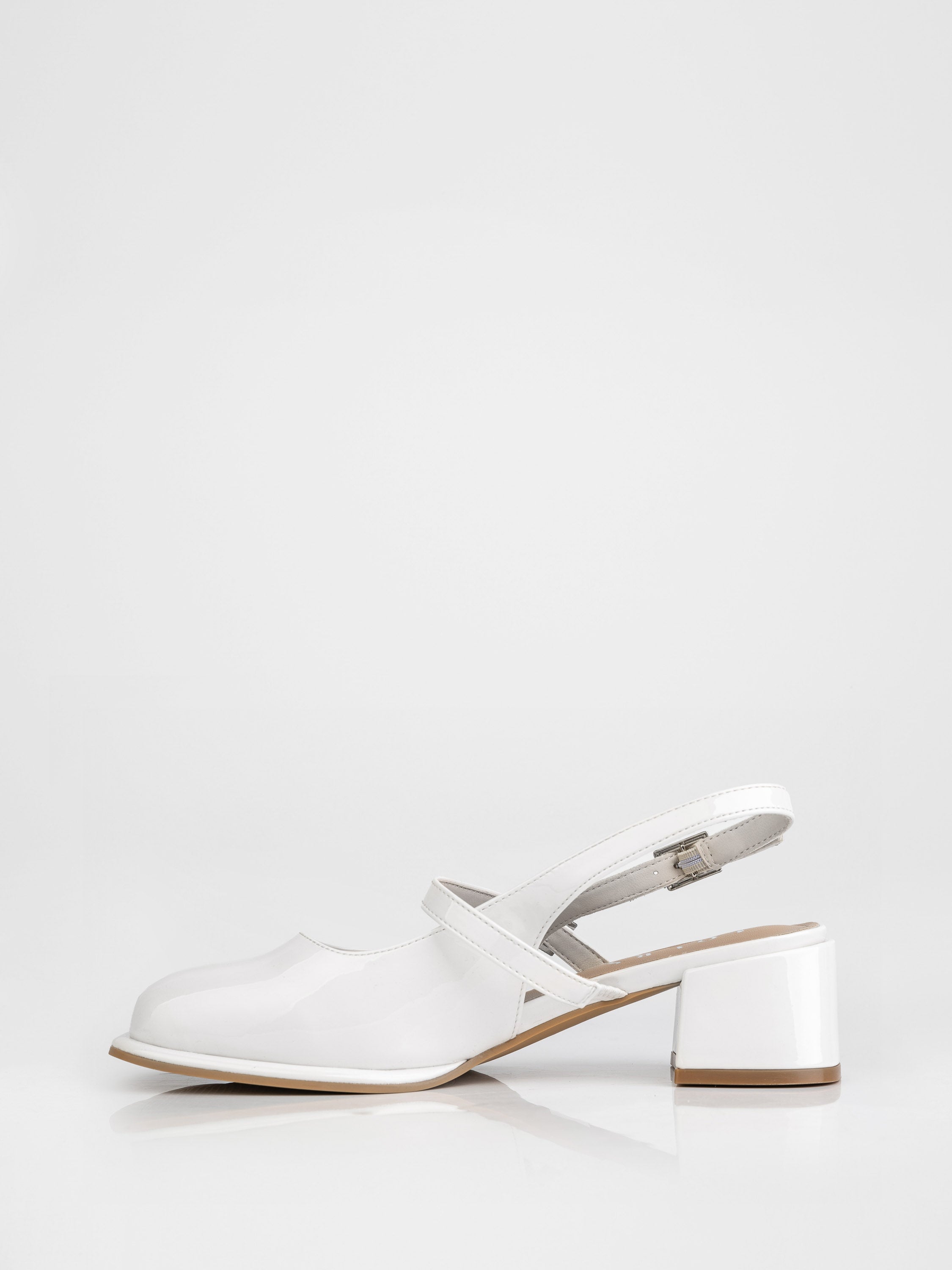 Slingbacks with stable heels in milky color.