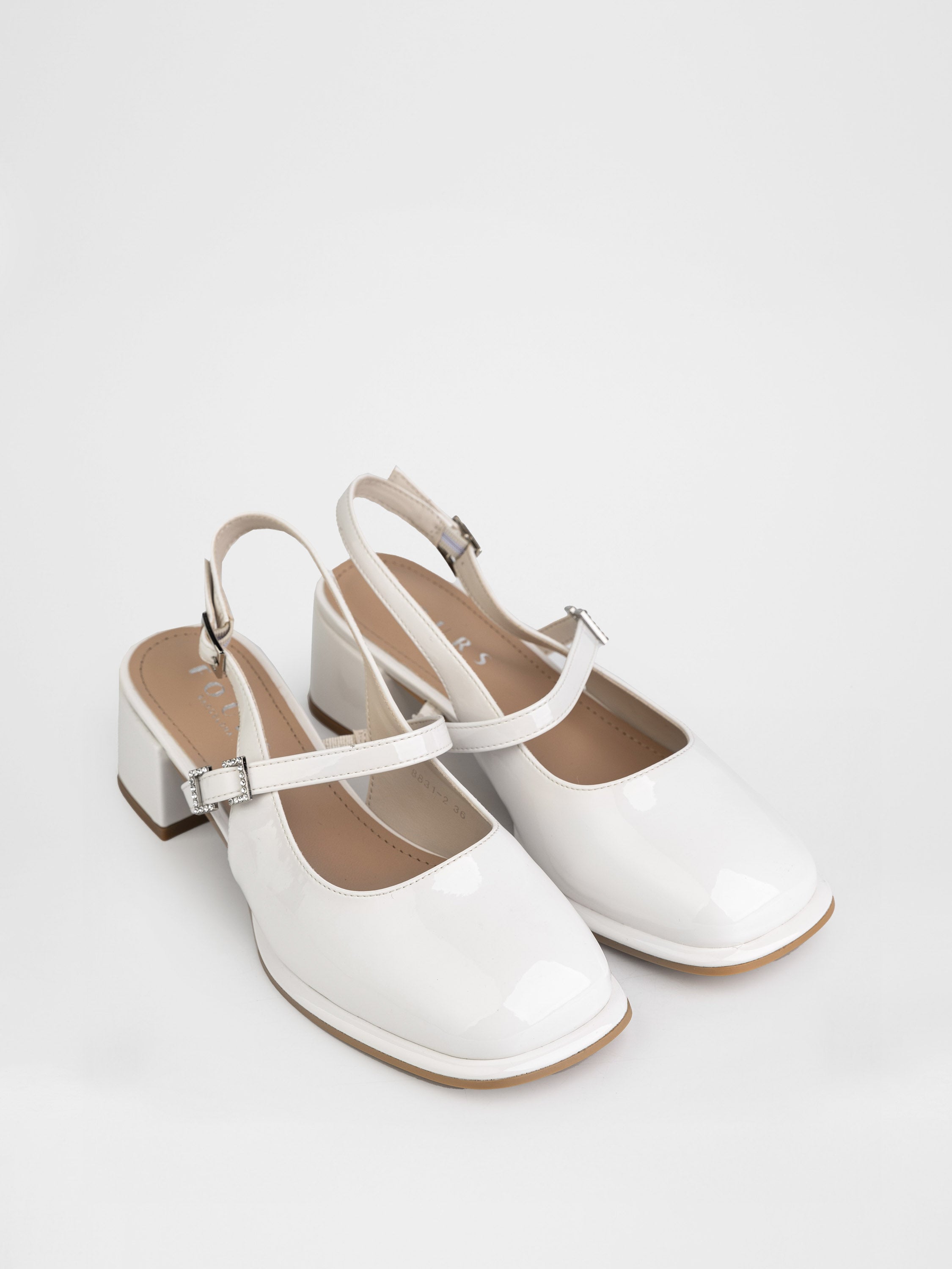 Slingbacks with stable heels in milky color.