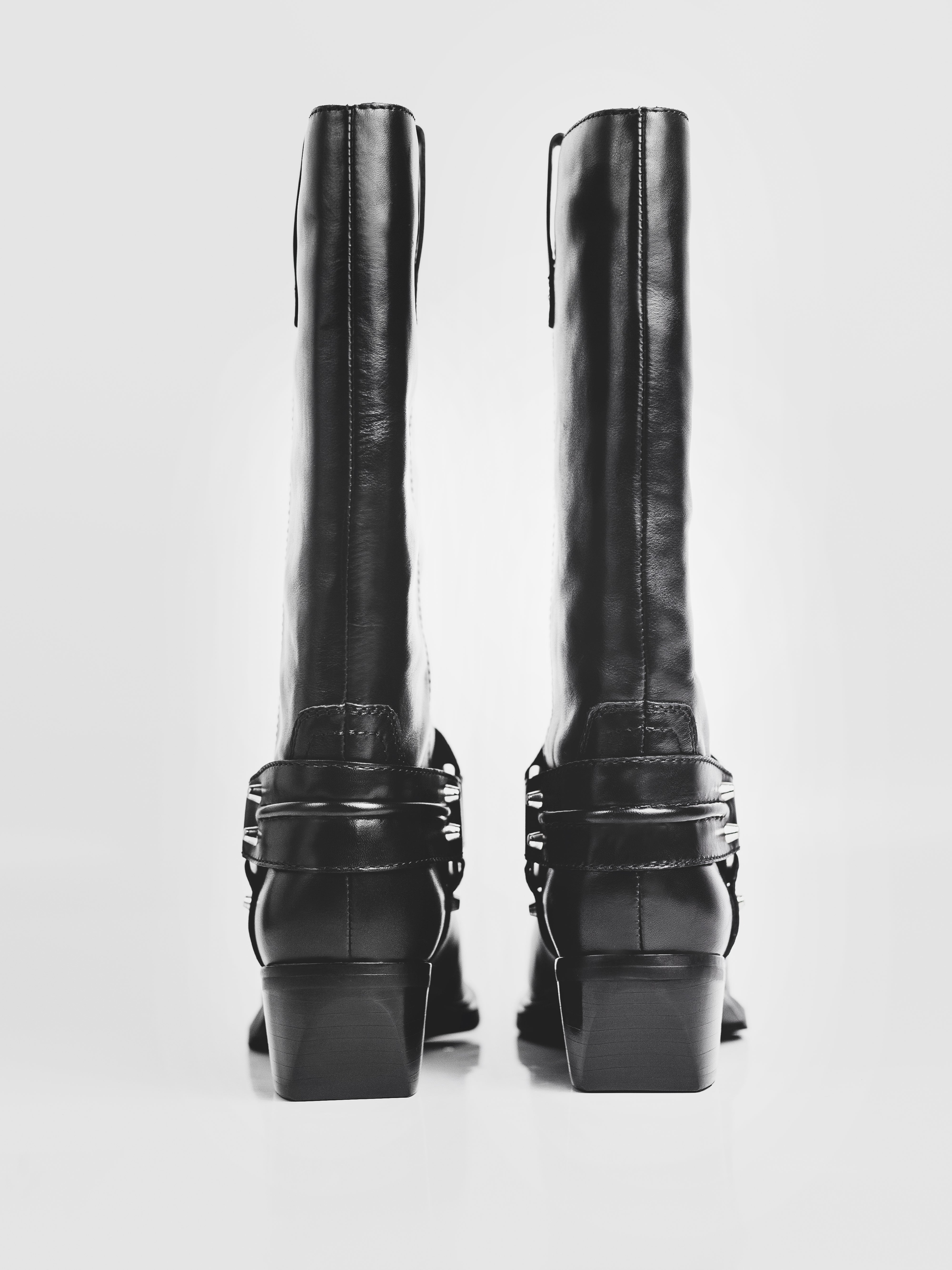 Bold Black Leather Heeled Boots