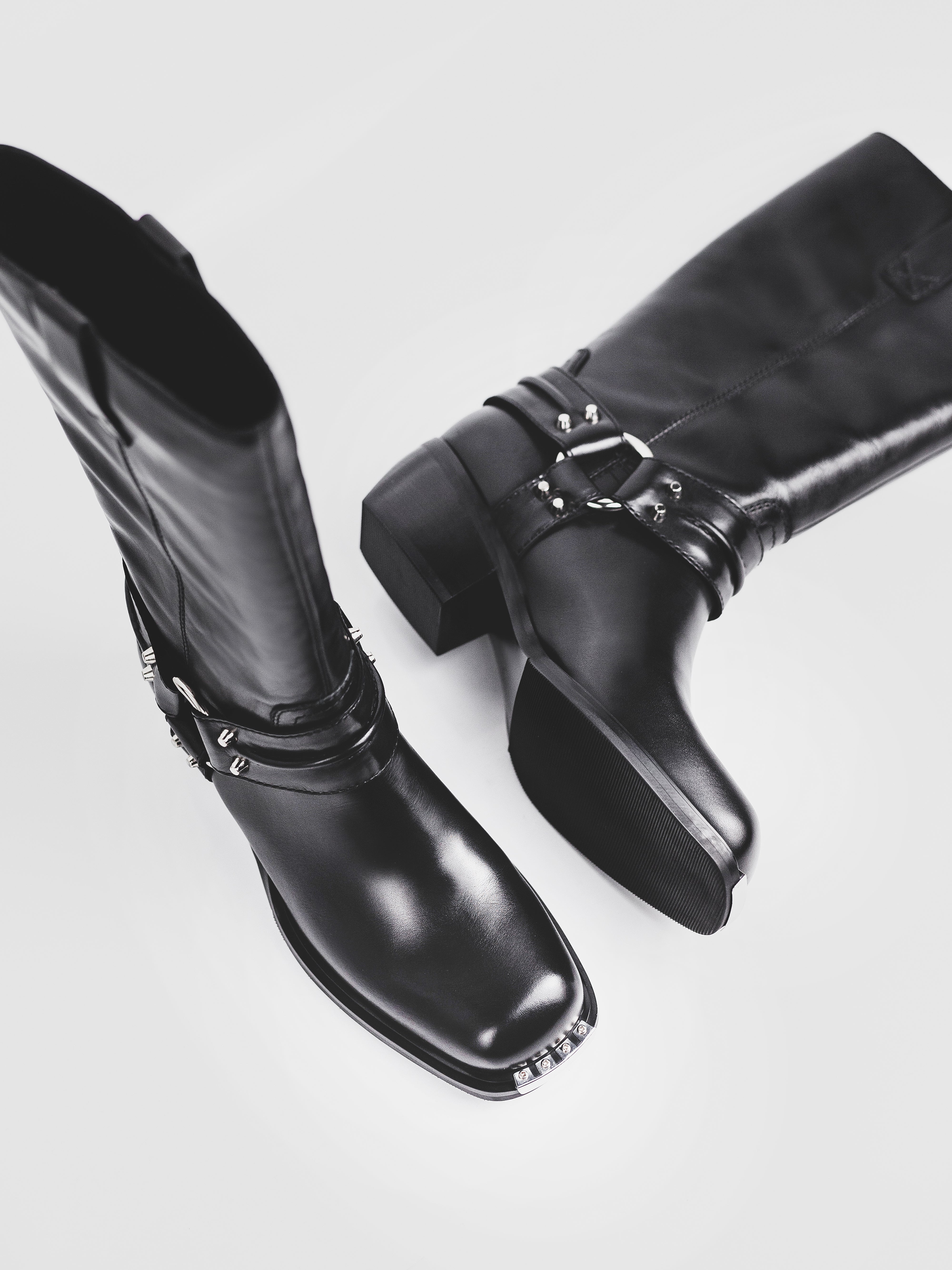 Bold Black Leather Heeled Boots