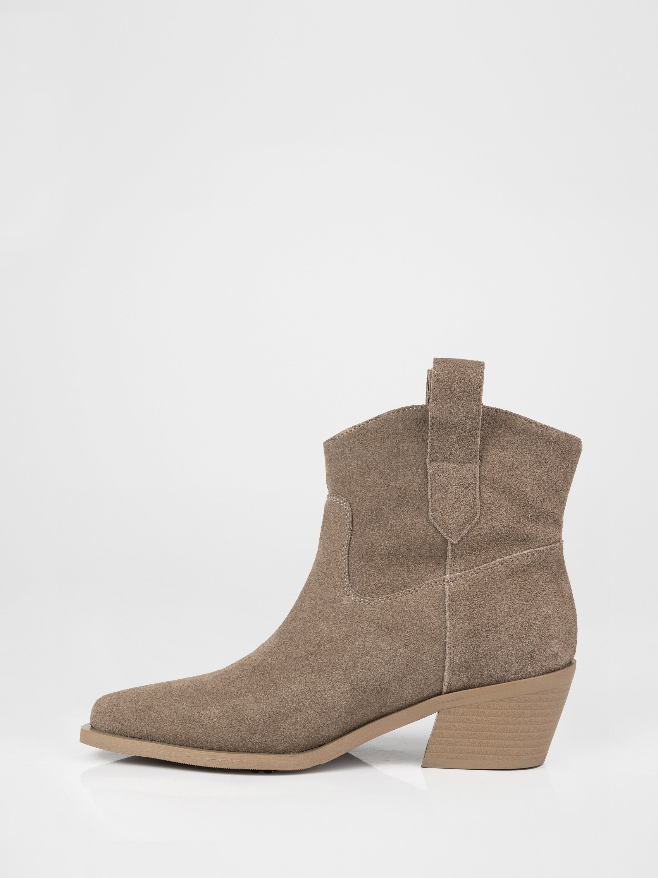 Suede cowboy boots in beige color