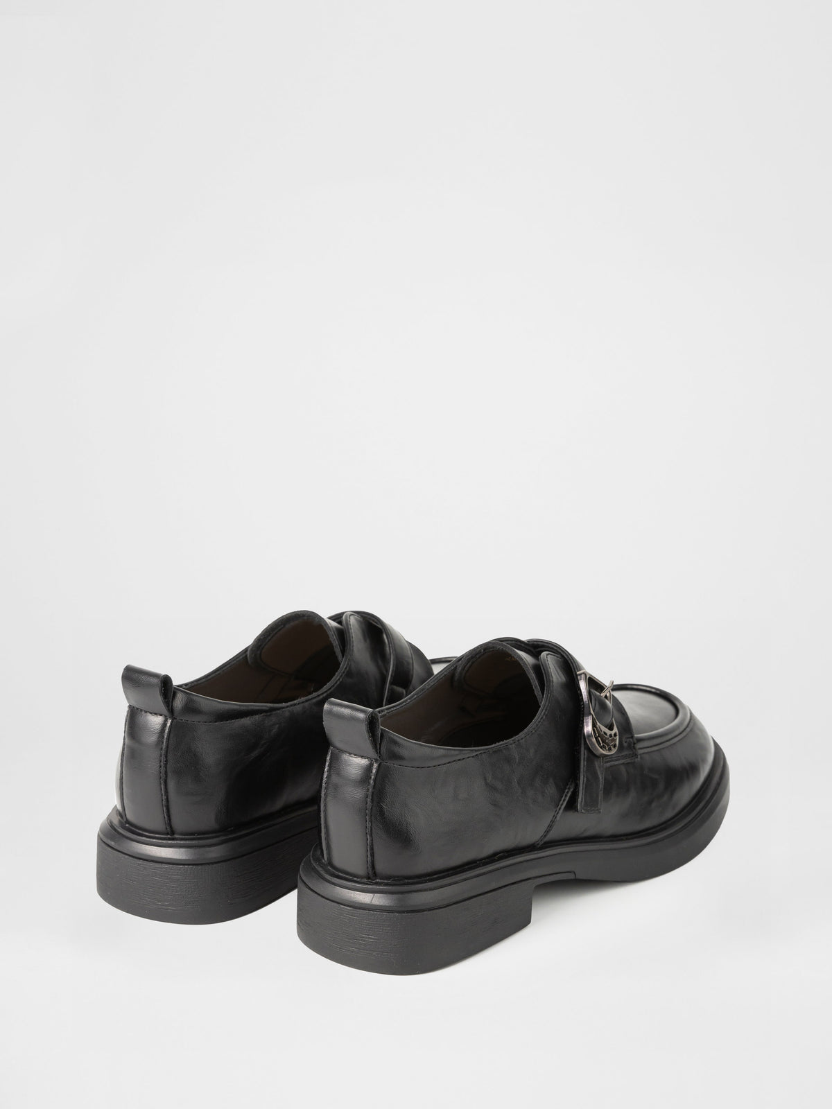 Zapatos monk de piel negra