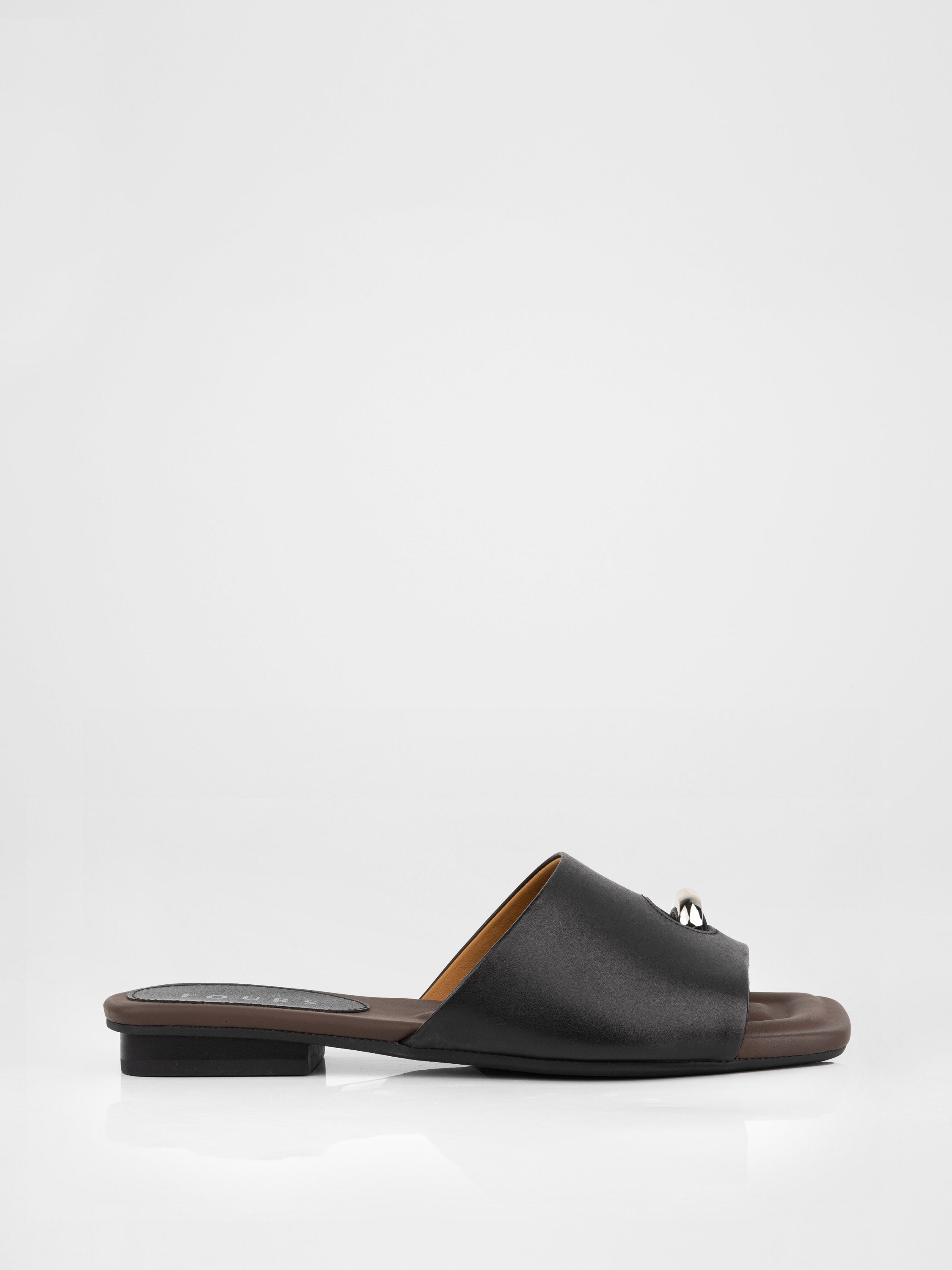 Genuine leather clogs with a decorative metal insert