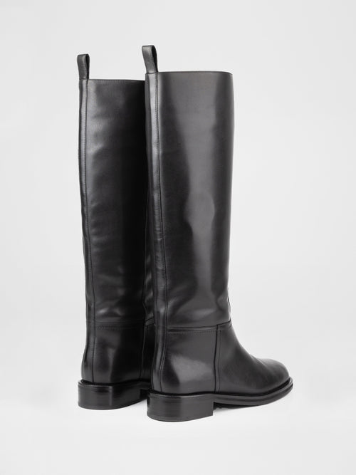 Botas altas de piel negra con forro de piel