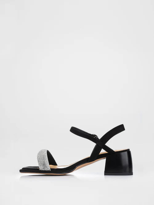 Black heeled sandals decorated with stones