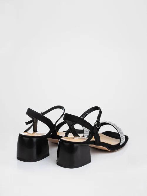 Black heeled sandals decorated with stones