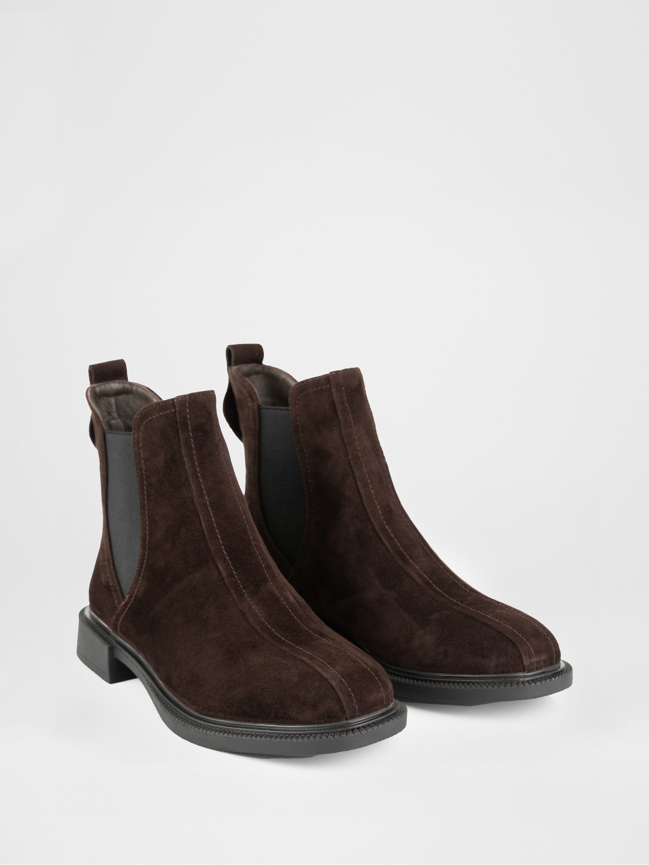 Chocolate-colored Chelsea boots