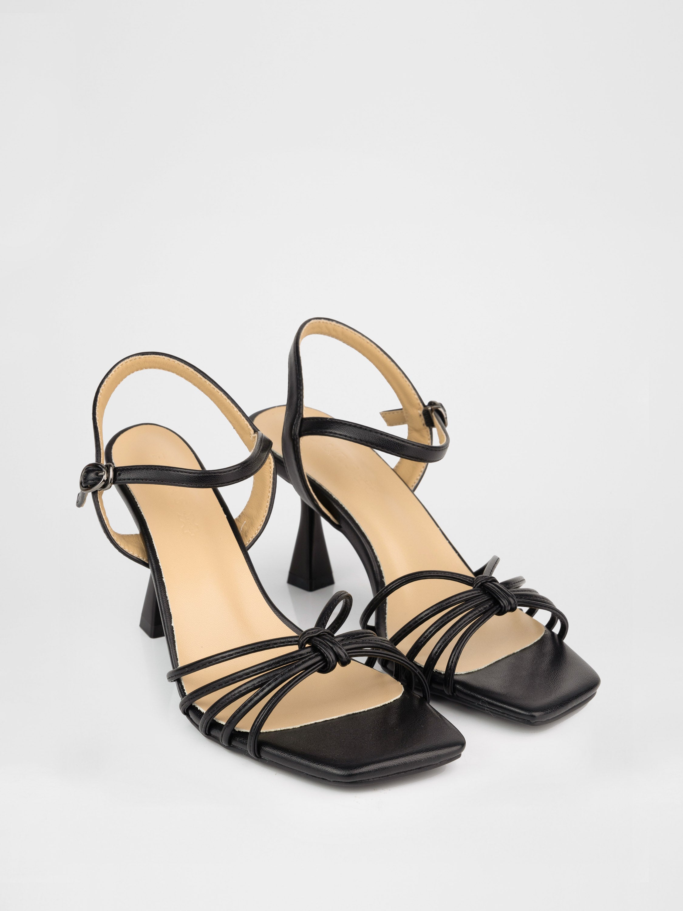 Black heeled sandals with thin straps