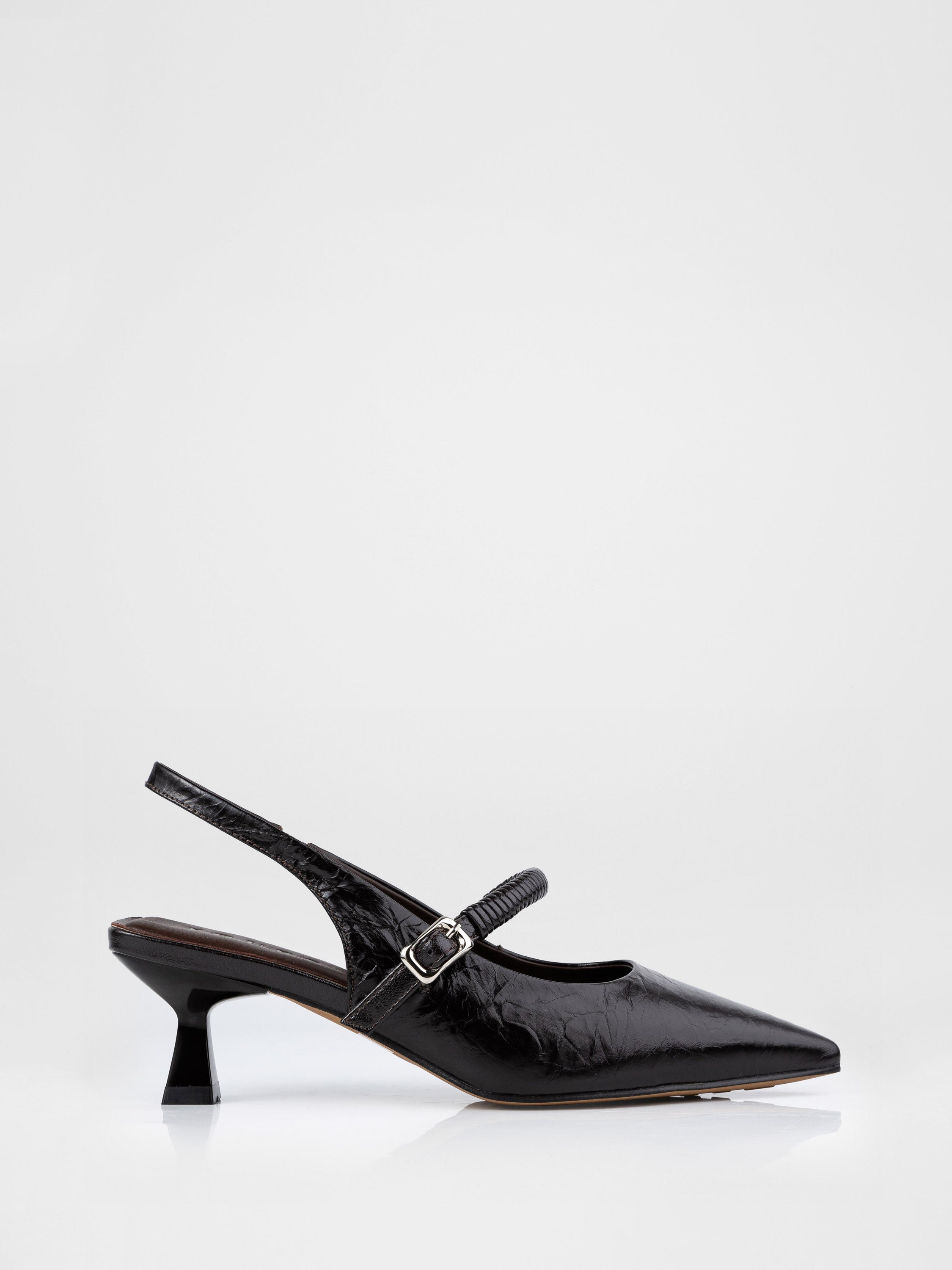Chocolate-colored patent leather slingbacks