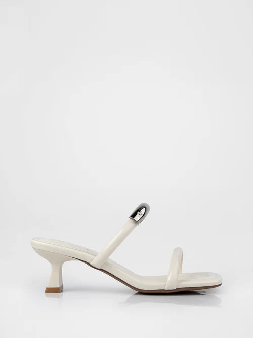 White heeled sandals with a thin strap