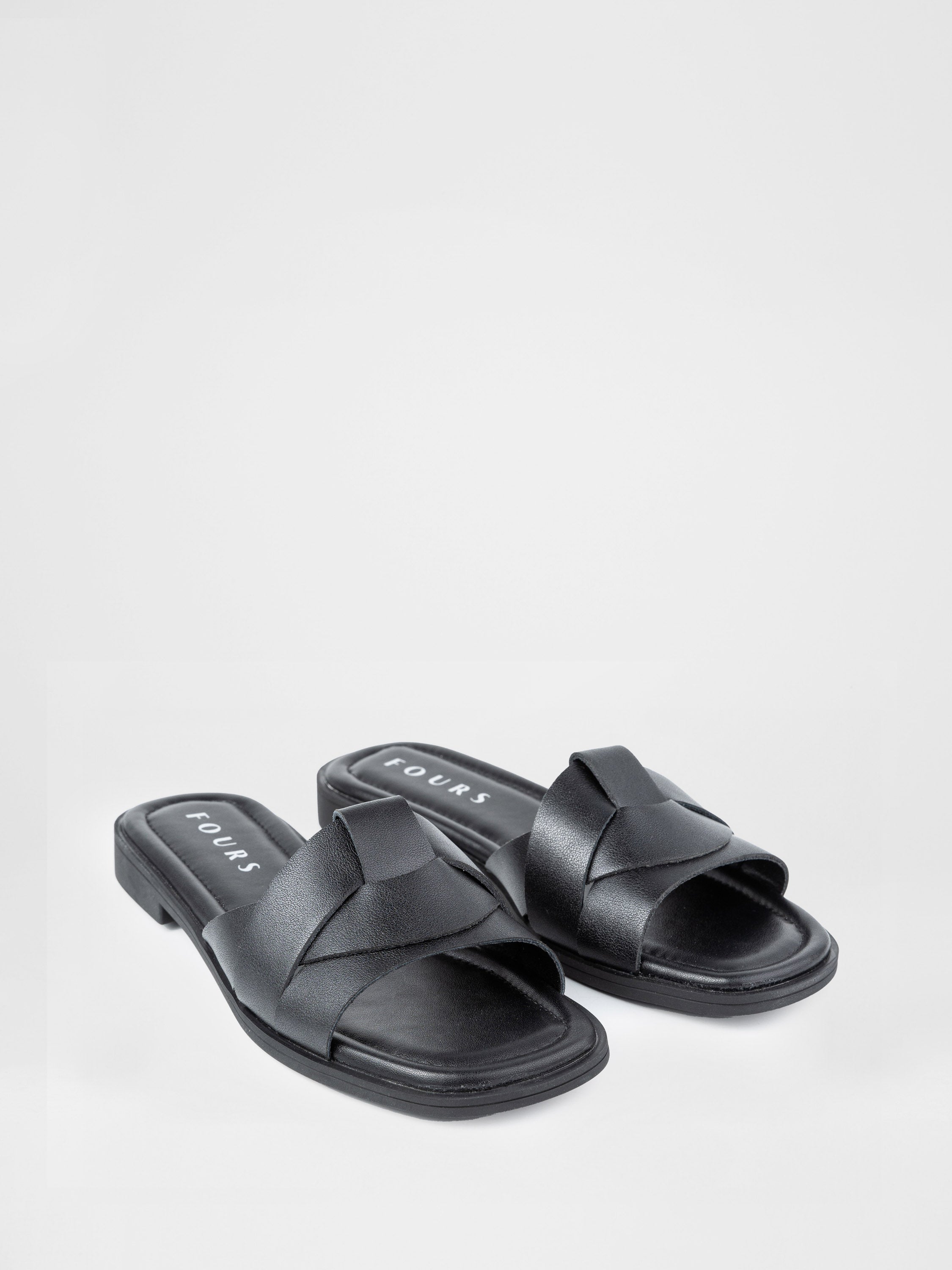 Black clogs with crisscross straps