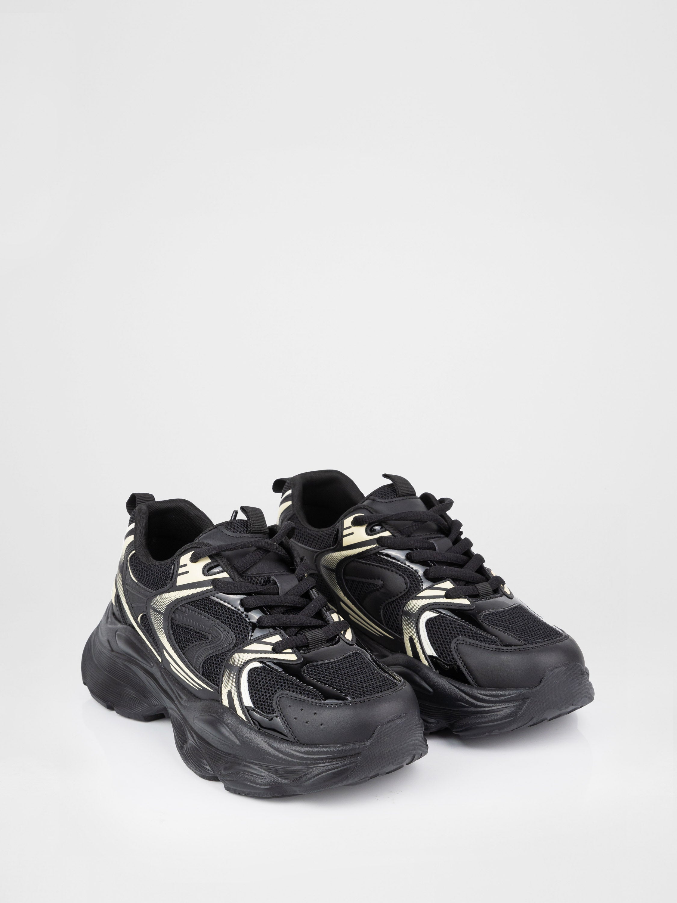 Sneakers in a black-and-white design with a chunky sole