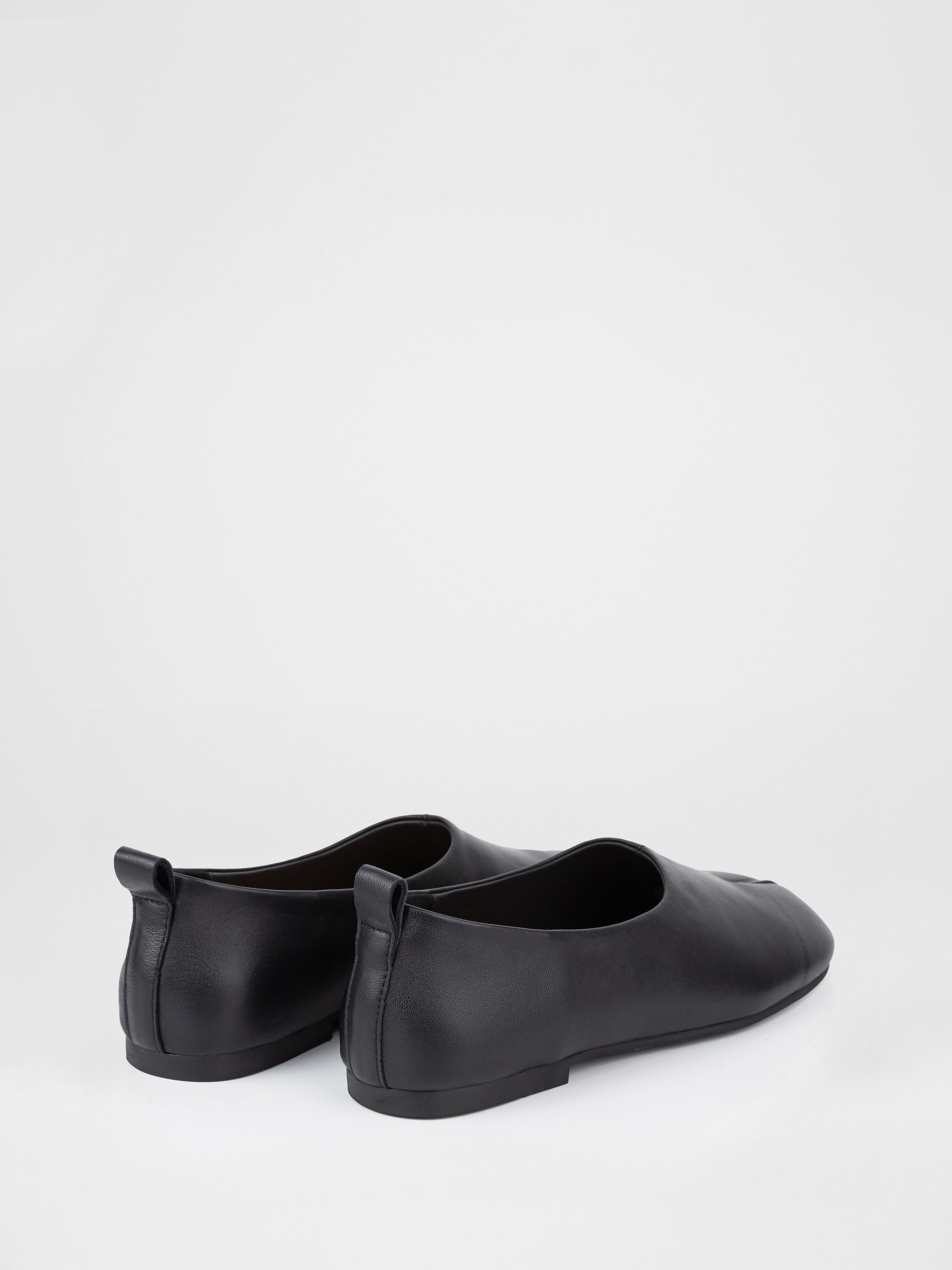 Black leather ballet flats