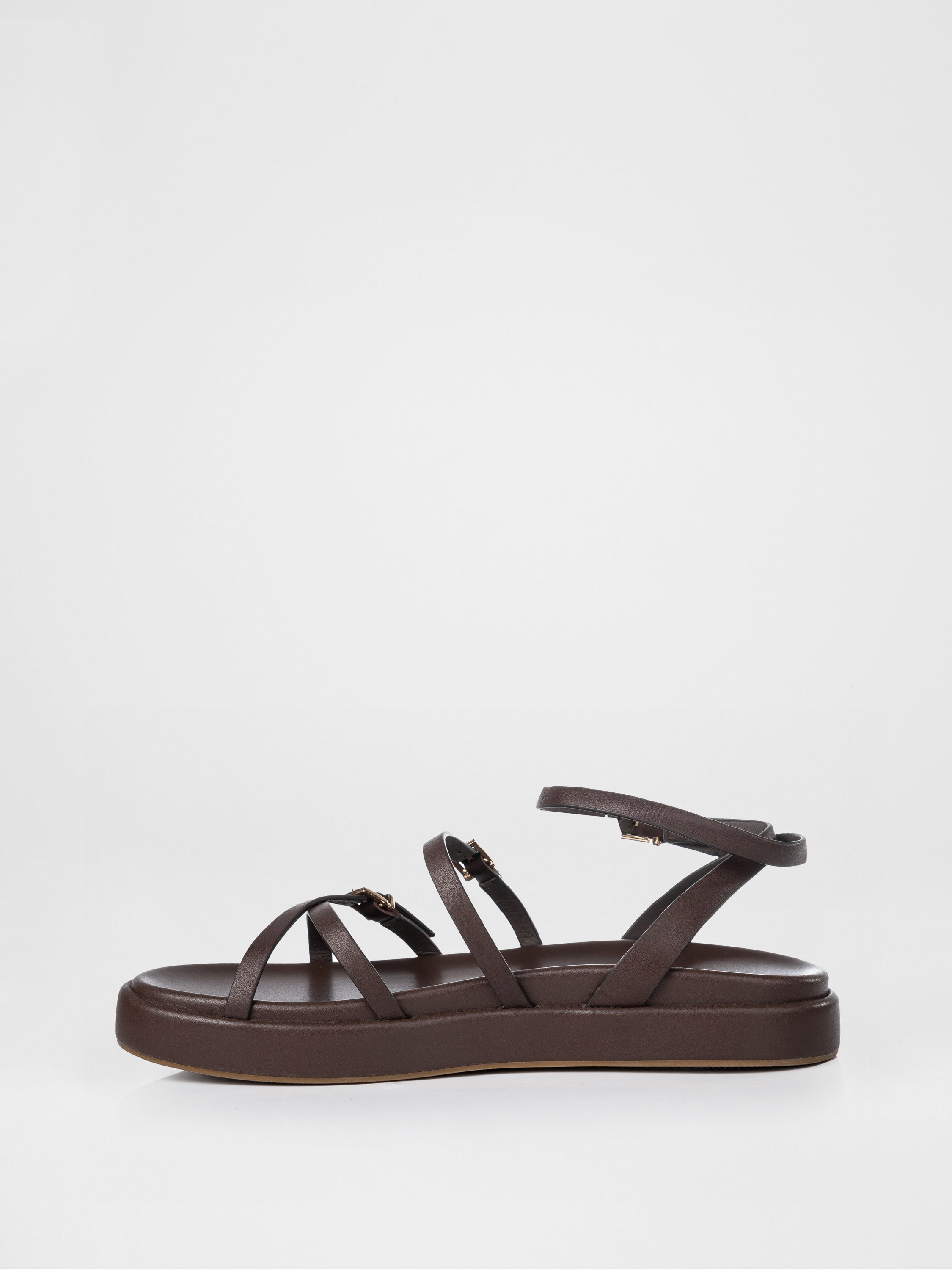 Chocolate-colored sandals decorated with buckles