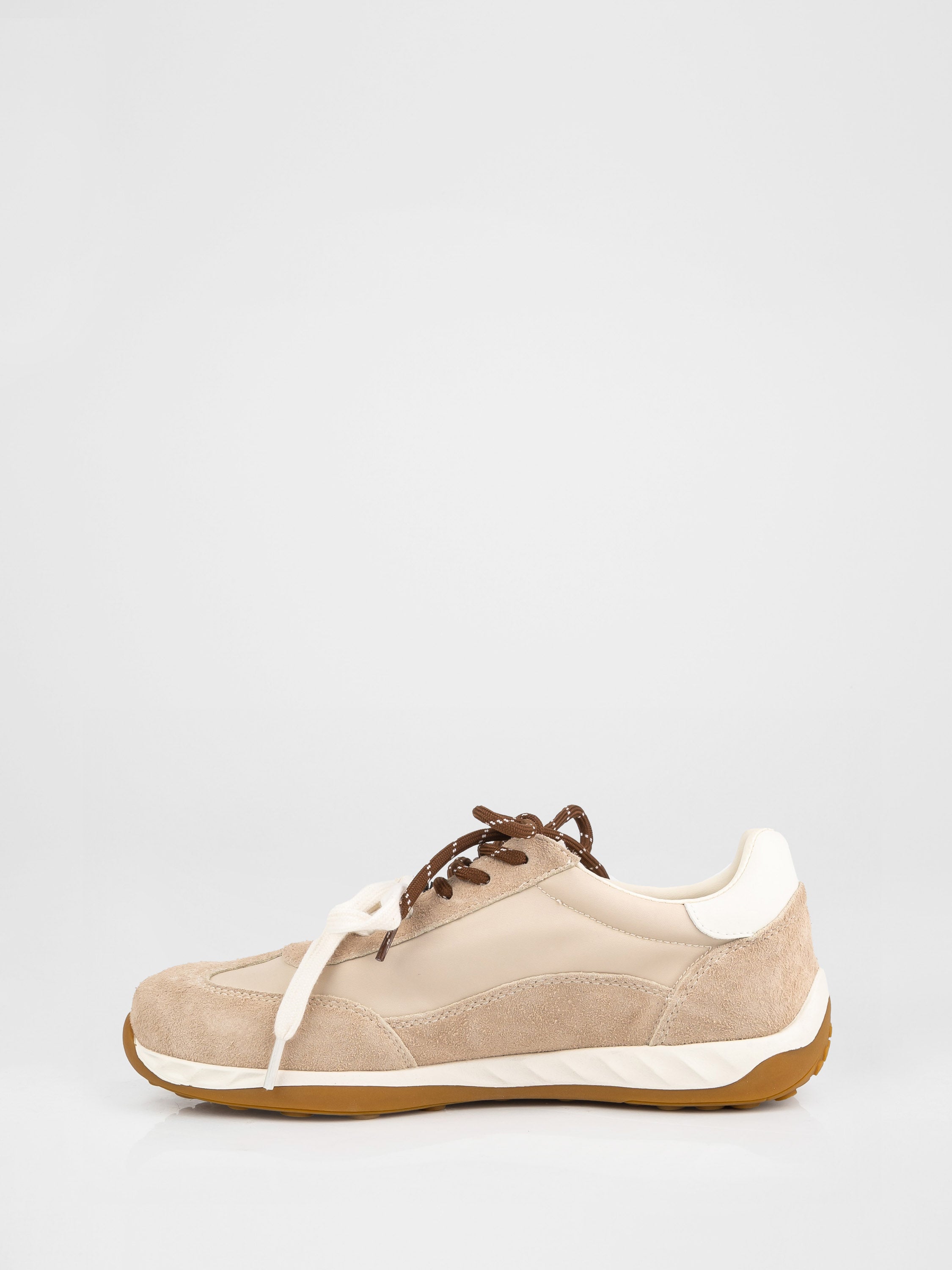 Trendy sneakers in beige