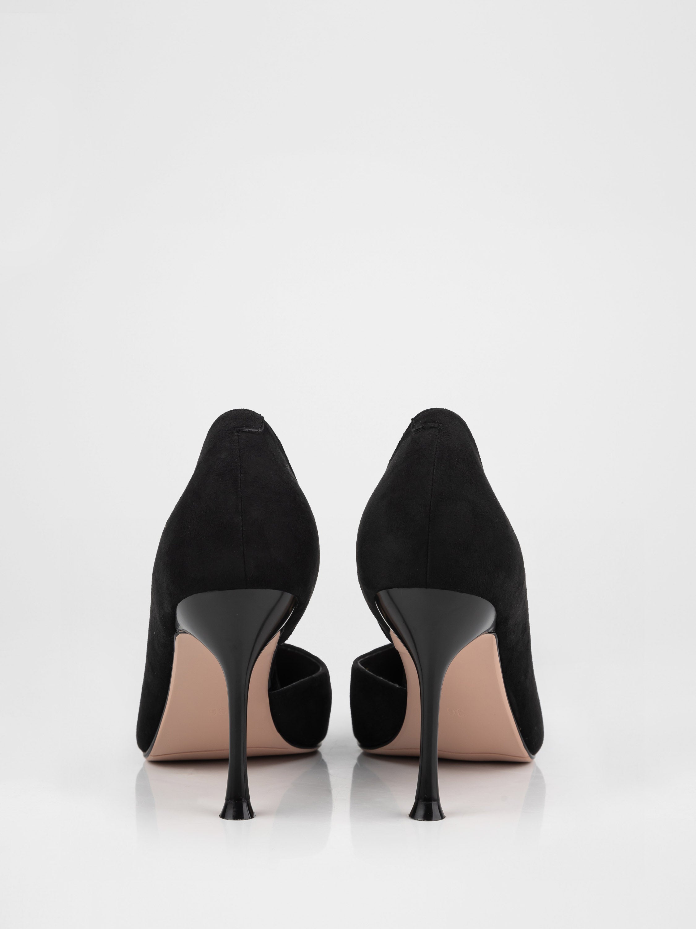 Black suede heeled pumps